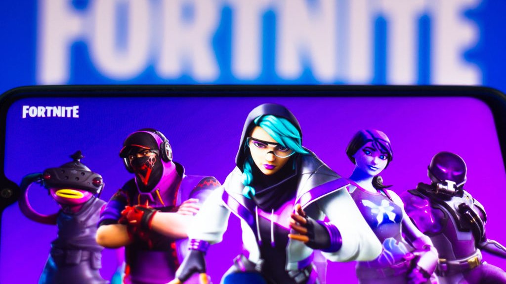 In this photo illustration the Fortnite logo is seen on a