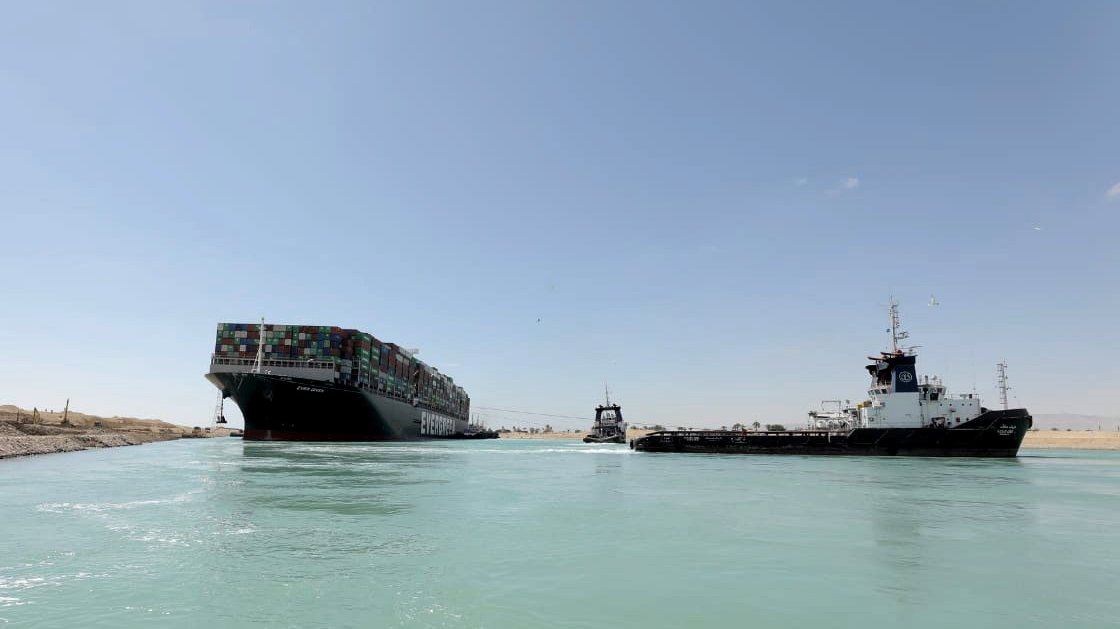 epa09105487 A handout photograph made available by the Suez Canal Authority shows the Ever Given container ship after it was refloated in the Suez Canal, Egypt, 29 March 2021. The head of the Suez Canal Authority announced on 29 March that the large container ship, which ran aground in the Suez Canal on 23 March, is now free floating after responding to the pulling maneuvers.  EPA/SUEZ CANAL AUTHORITY / HANDOUT HANDOUT  HANDOUT EDITORIAL USE ONLY/NO SALES