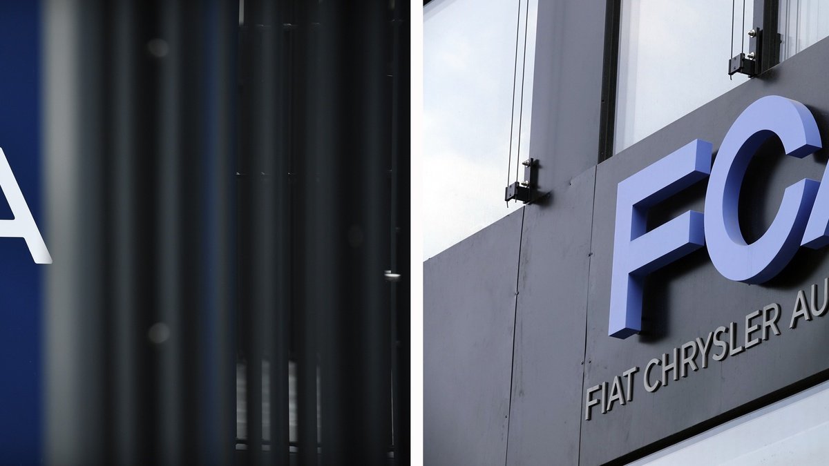 epa08918832 (FILE) - A view of signage at the PSA Group headquarters in Rueil-Malmaison, near Paris, France, 31 October 2019 (L) and signage of Italian-US car manufacturer FCA, Fiat Chrysler Automobiles, at an office building in Frankfurt am Main, Germany, 04 May 2018 (reissued 04 January 2021). Media reports on 04 January state SA Group  and FCA are on 04 May looking for approval from both companies&#039; shareholders for their planned 52 billion USD merger deal. If approved, the deal would create world&#039;s 4th biggest car maker that the two plan to call  Stellantis.  EPA/JULIEN DE ROSA / MAURITZ ANTIN *** Local Caption *** 56457163