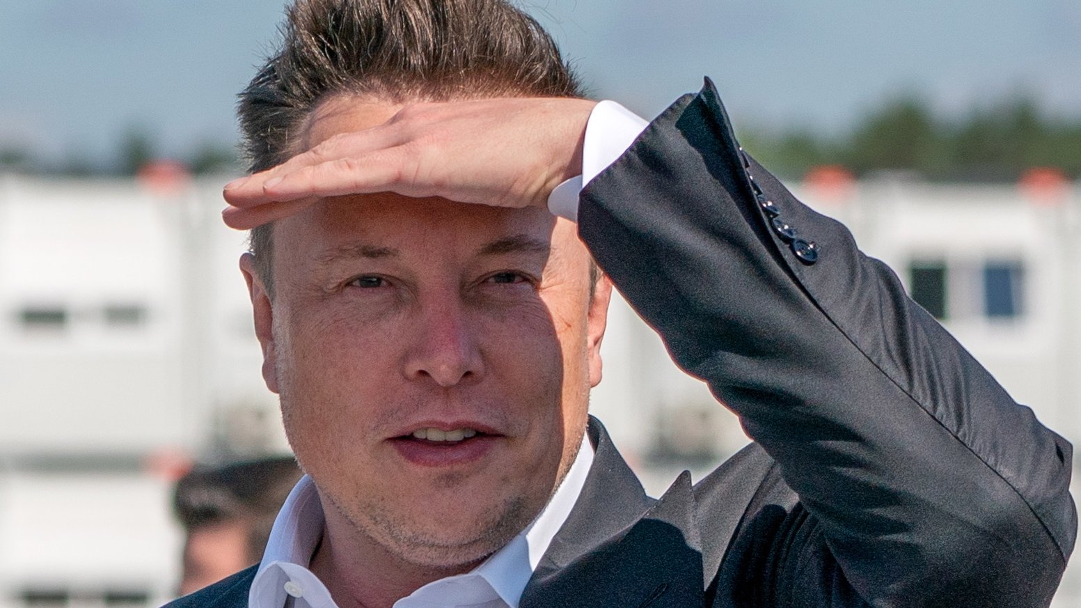 epa09889605 (FILE) - Tesla and SpaceX CEO Elon Musk arrives for a statement at the construction site of the Tesla Giga Factory in Gruenheide near Berlin, Germany, 03 September 2020 (reissued 14 April 2022). A statement published by the US Securities and Exchange Commission (SEC) on 14 April 2022 reads that Elon Musk has filed a proposal to acquire all available Twitter shares at a price of 54.20 US dollars per share, an offer that would total in 43.4 billion USD of company value.  EPA/ALEXANDER BECHER *** Local Caption *** 56315886