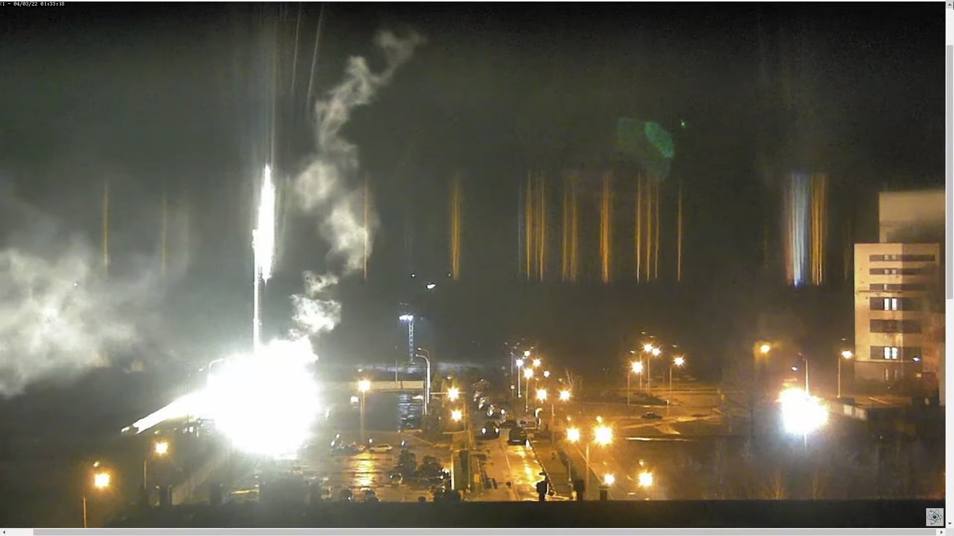 epa09800930 A screen grab taken from a surveillance camera footage the Zaporizhzhya NPP published on YouTube shows a flare landing at the Zaporizhzhia nuclear power plant during shelling, Ukraine, 04 March 2022. A fire at Zaporizhzhia, the largest nuclear power plant in Europe, was was extinguished after shelling by Russia earlier in the day, the State Emergency Service said. Russian troops entered Ukraine on 24 February prompting the country&#039;s president to declare martial law and triggering a series of severe economic sanctions imposed by Western countries on Russia.  EPA/Zaporizhzhya NPP / HANDOUT  HANDOUT EDITORIAL USE ONLY/NO SALES