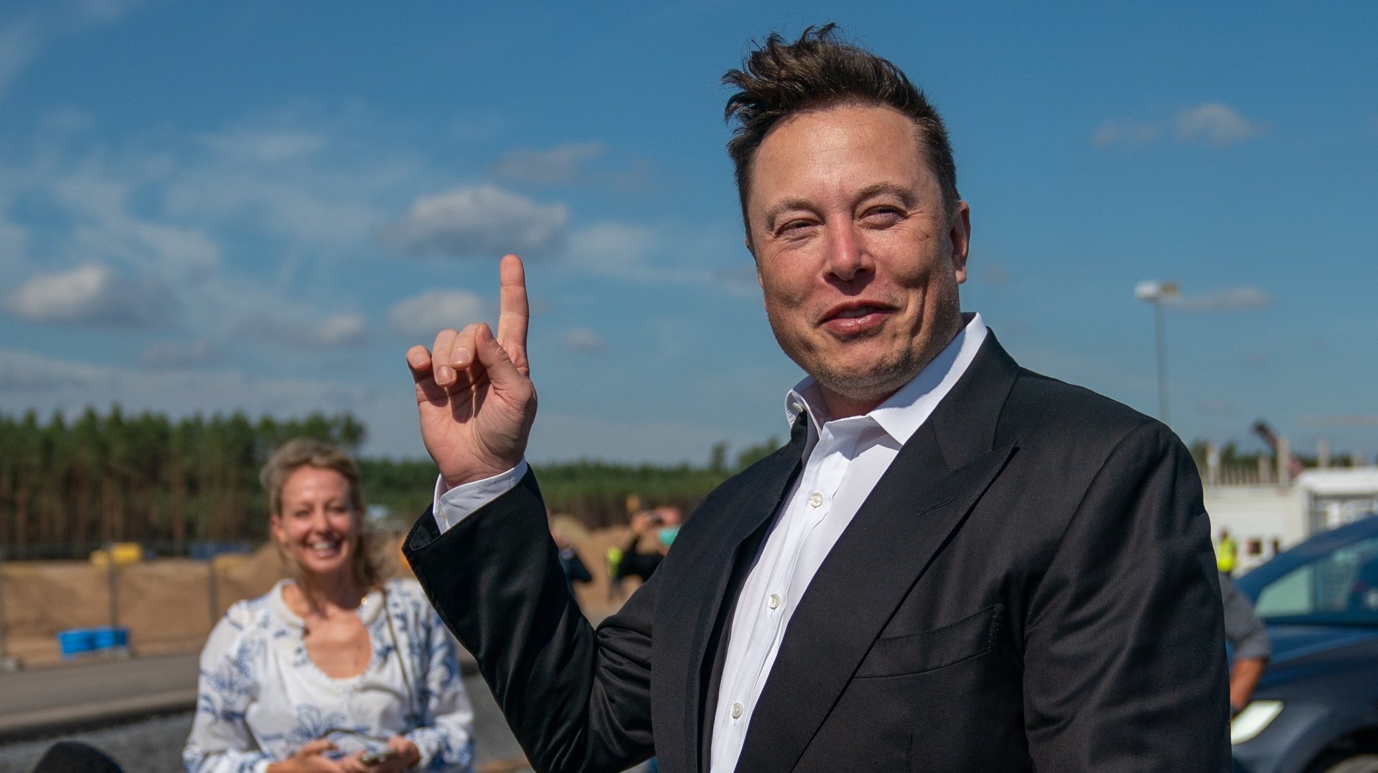 epa08925442 (FILE) - Tesla and SpaceX CEO Elon Musk (R) gives a statement at the construction site of the Tesla Giga Factory in Gruenheide near Berlin, Germany, 03 September 2020 (Reissued 07 January 2021). According to reports on 07 January 2021, Tesla and SpaceX CEO Elon Musk became the world richest person with a net worth of more than 185 billion US dollars, surpassing Jeff Bezos, CEO of Amazon, who is currently worth 184 billion US dollars.  EPA/ALEXANDER BECHER *** Local Caption *** 56315718