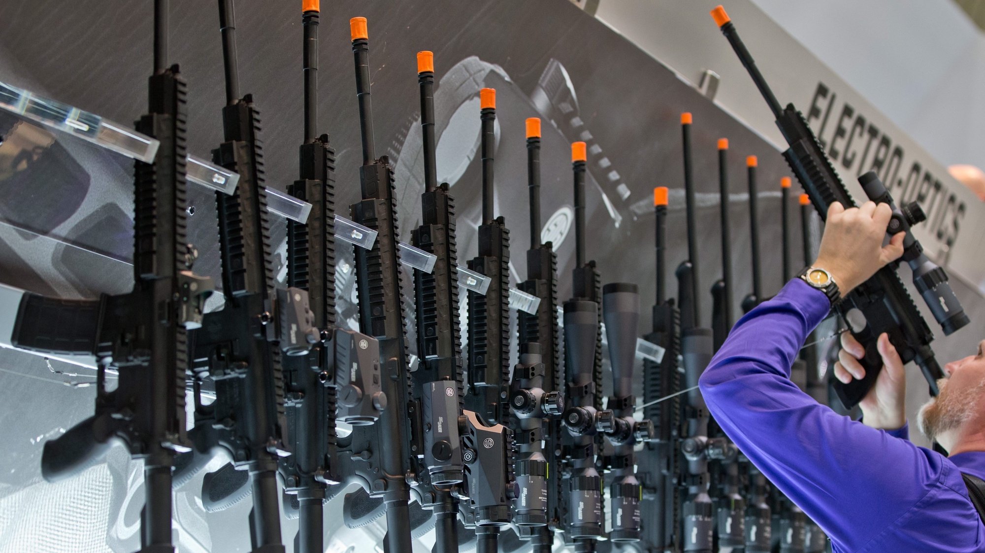 epa04650345 Rifles manufactured by SIG Sauer are on display at the IWA OutdoorClassics exhibition for Hunting Guns and Outdoor Equipment, in Nuremberg, Germany, 06 March 2015. The fair for &#039;High performance in target sport, nature activities, protecting people&#039; runs from 06 to 09 March 2015.  EPA/DANIEL KARMANN