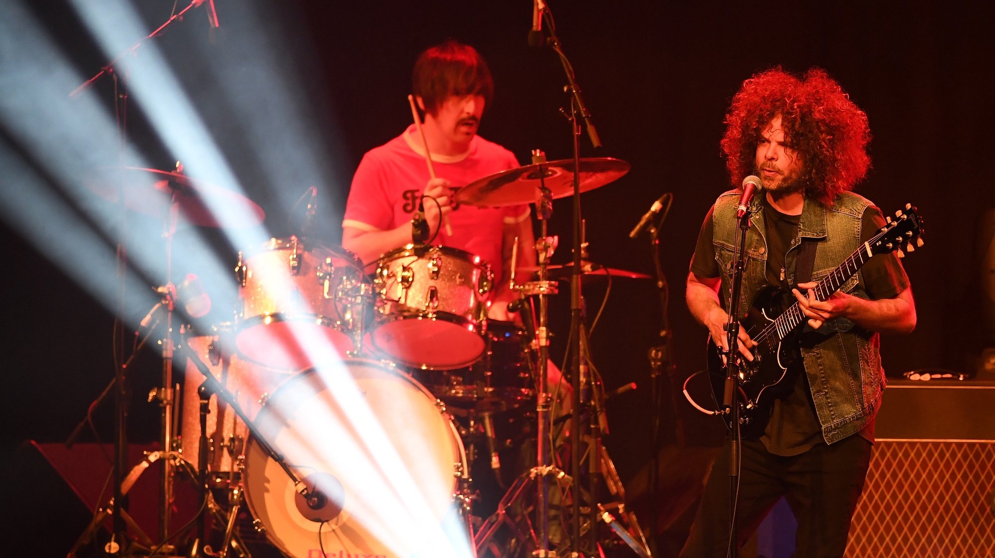 epa07875895 Hamish Rosser (L) and Andrew James Stockdale (R) of Australian hard rock band Wolfmother perform on stage during the AFL North Melbourne Grand Final Breakfast at the Melbourne Convention and Exhibition Centre in Melbourne, Victoria, Australia, 28 September 2019. The Richmond Tigers play the GWS Giants in the 2019 AFL Grand Final.  EPA/JULIAN SMITH  AUSTRALIA AND NEW ZEALAND OUT