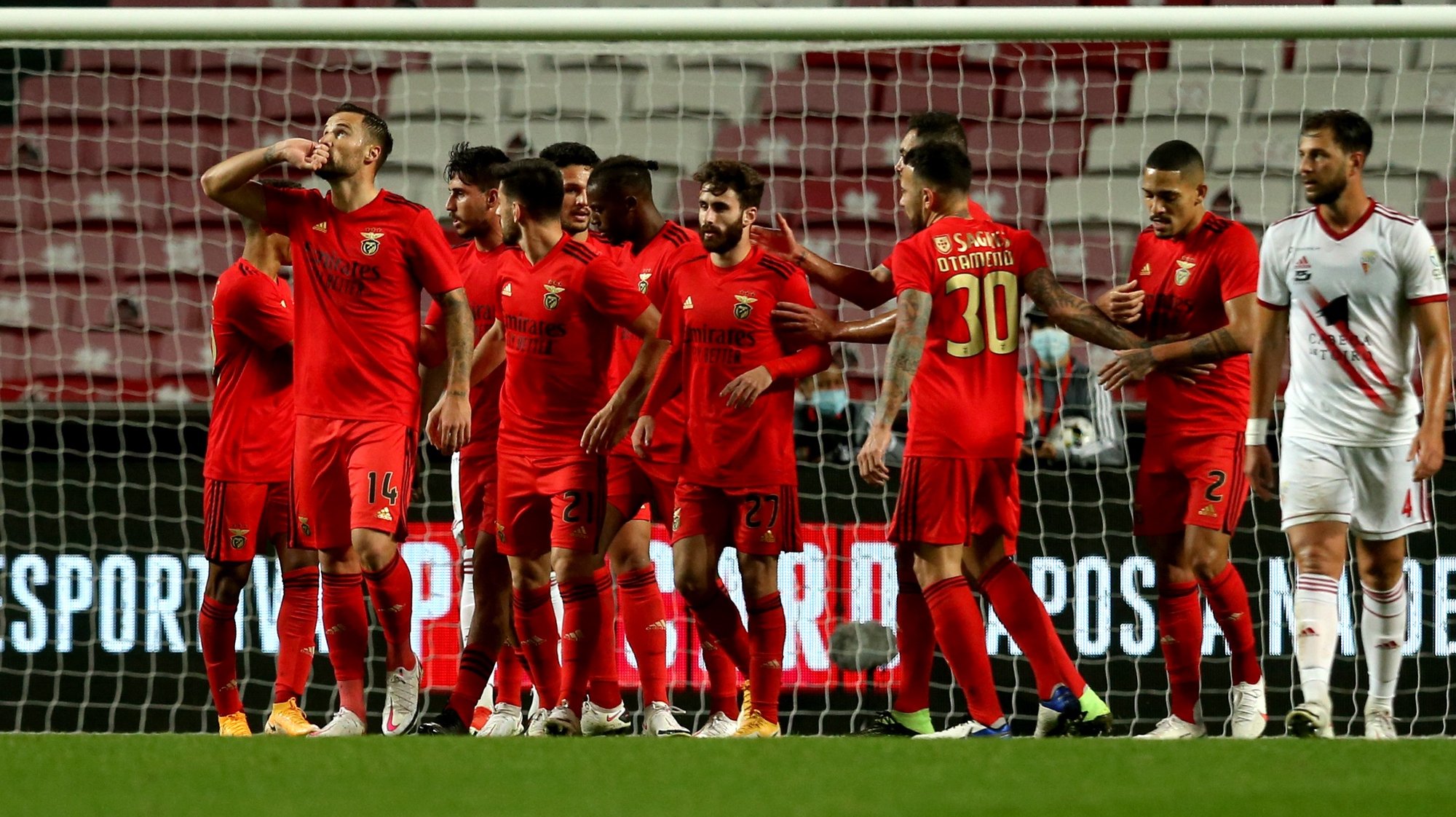 Benfica players celebrate after scoring a goal against Vilafranquense during  their 4th round of Portugal Cup soccer match held at Luz  stadium, in Lisbon, Portugal, 13th December 2020.  MANUEL DE ALMEIDA/LUSA