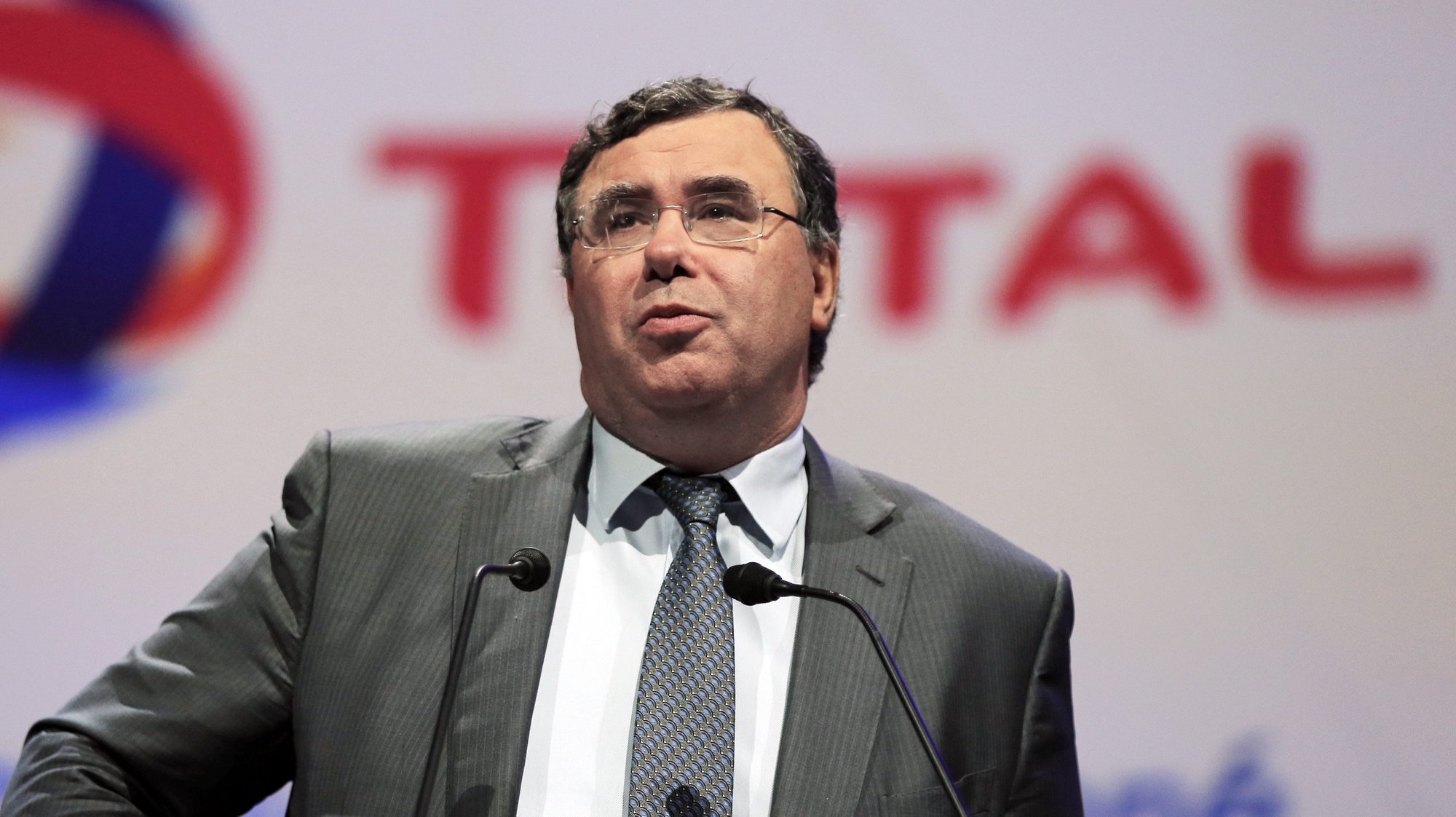 epa04779623 French energy group Total CEO Patrick Pouyanne delivers a speech during the opening ceremony of the 26th World Gas Conference (WGC) in Paris, France, 02 June 2015. The WGC runs from 01 to 05 June and gathers the world gas market leaders.  EPA/ETIENNE LAURENT
