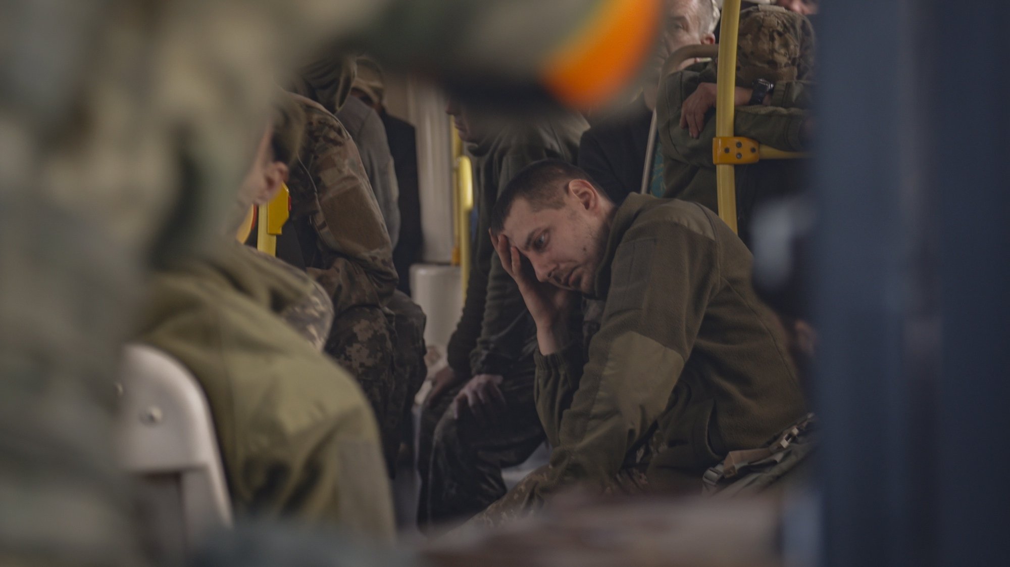 epa09953866 Ukrainian servicemen sitting in a bus as they are being evacuated from the besieged Azovstal steel plant in Mariupol, Ukraine, 17 May 2022. A total of 265 Ukrainian militants, including 51 seriously wounded, have laid down arms and surrendered to Russian forces, the Russian Ministry of Defence said on 17 May 2022. Those in need of medical assistance were sent for treatment to a hospital in Novoazovsk, the ministry states further. Russian President Putin on 21 April 2022 ordered his Defence Minister to not storm but to blockade the plant where a number of Ukrainian fighters were holding out. On 24 February, Russian troops invaded Ukrainian territory starting a conflict that has provoked destruction and a humanitarian crisis. According to the UNHCR, more than six million refugees have fled Ukraine, and a further 7.7 million people have been displaced internally within Ukraine since.  EPA/ALESSANDRO GUERRA
