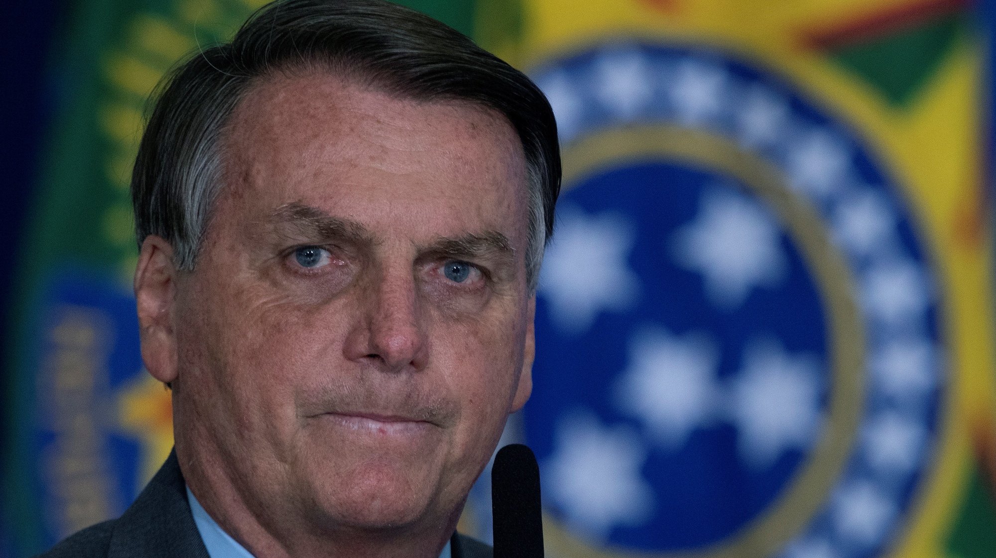 epa09210513 President of Brazil Jair Bolsonaro participates in the launching ceremony of the Los Gigantes de lo Alfalto program, in Brasilia, Brazil, 18 May 2021. Former Brazilian Foreign Minister Ernesto Araujo attributed the erratic fight to Covid-19 to the Ministry of Health, when he appeared on 18 May before a Senate commission that investigates possible omissions of the Government in the face of a pandemic that has already killed almost 440,000 people in the country.  EPA/Joedson Alves