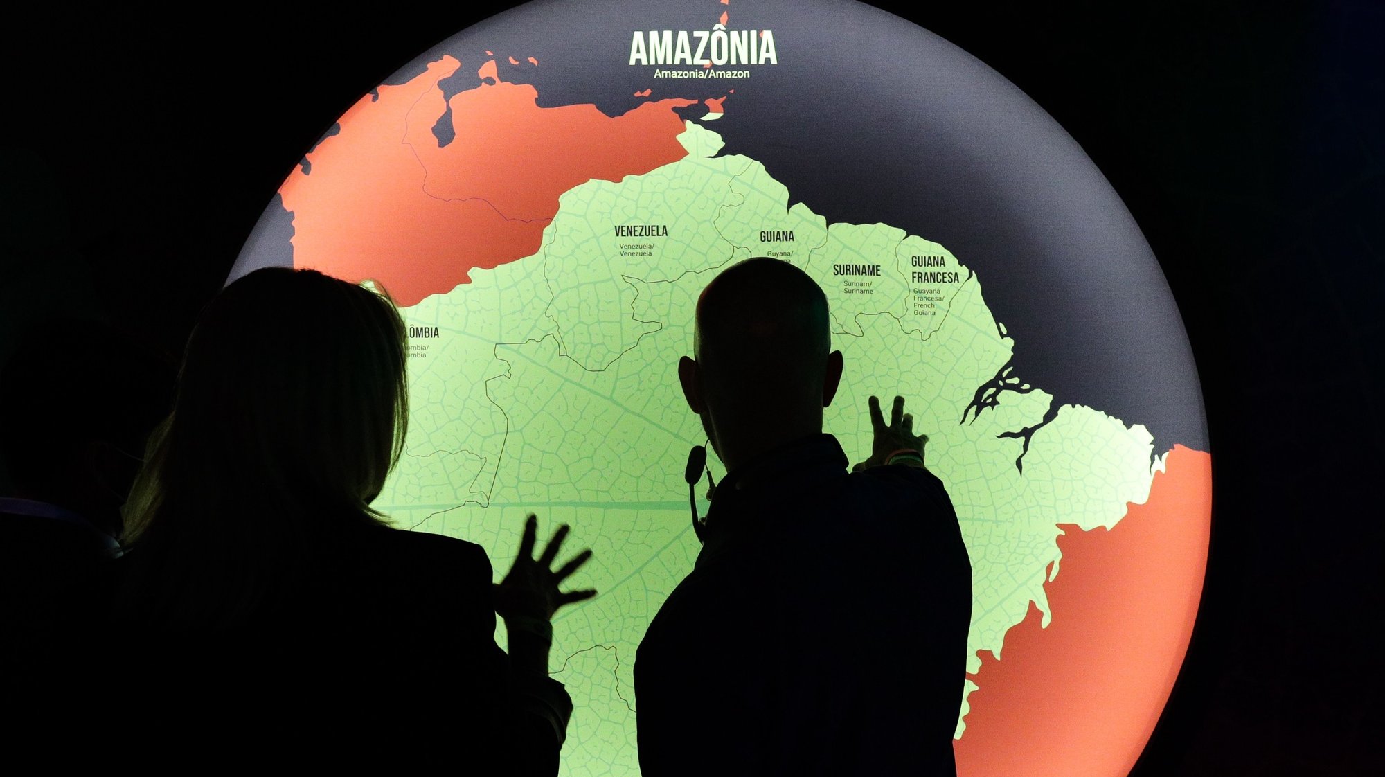 epa09646878 Visitors enjoy a tour prior to the opening of the exhibition &#039;Fruturos - Tempos Amazonicos&#039; (Fruits - Amazon Times) at the Amanha Museum in Rio de Janeiro, Brazil, 16 December 2021 (issued 17 December 2021). The immensity of the Amazon, its richness, the ethnic groups that live there and their customs, are part of an exhibition in Rio de Janeiro that from 17 December on immerses the viewer in the reality of the most extensive tropical forest on the planet to highlight the urgency of its conservation. The exhibition &#039;Futures&#039;, which can be seen until June 2022 at the Museum of Tomorrow in Rio, brings an updated perspective of this biome and proposes new challenges to keep the forest standing.  EPA/Andre Coelho