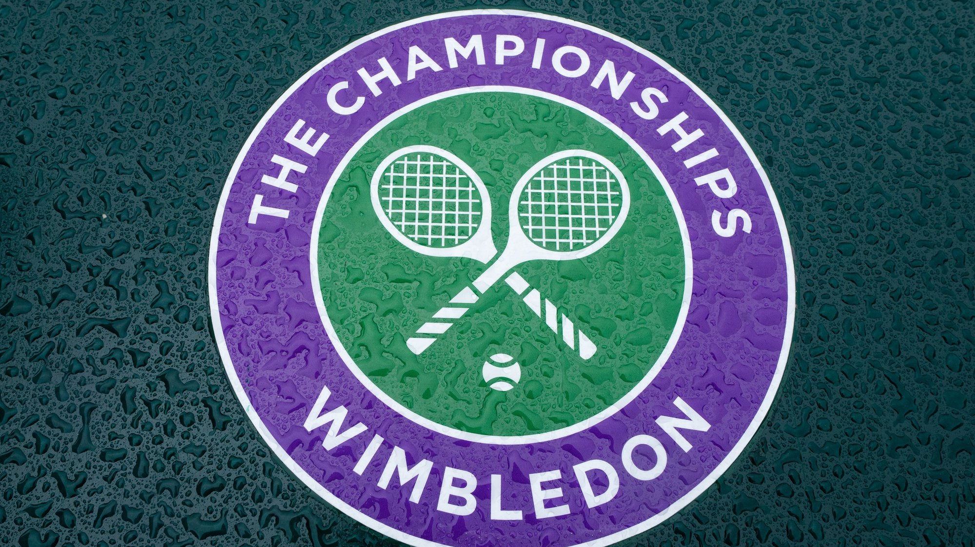 epa08513898 Detail of a wet Wimbledon logo at the All England Lawn Tennis Club on a stormy Saturday 27th June 2020 the weekend before The Championships were due to start on Monday 29th June 2020. The grounds are quiet and still, normally they would be busy and bustling with players practising and groundsmen and staff making the final detailed preparations. The Championships have been cancelled due to the Coronavirus pandemic.  EPA/AELTC/Bob Martin HANDOUT  HANDOUT EDITORIAL USE ONLY/NO SALES