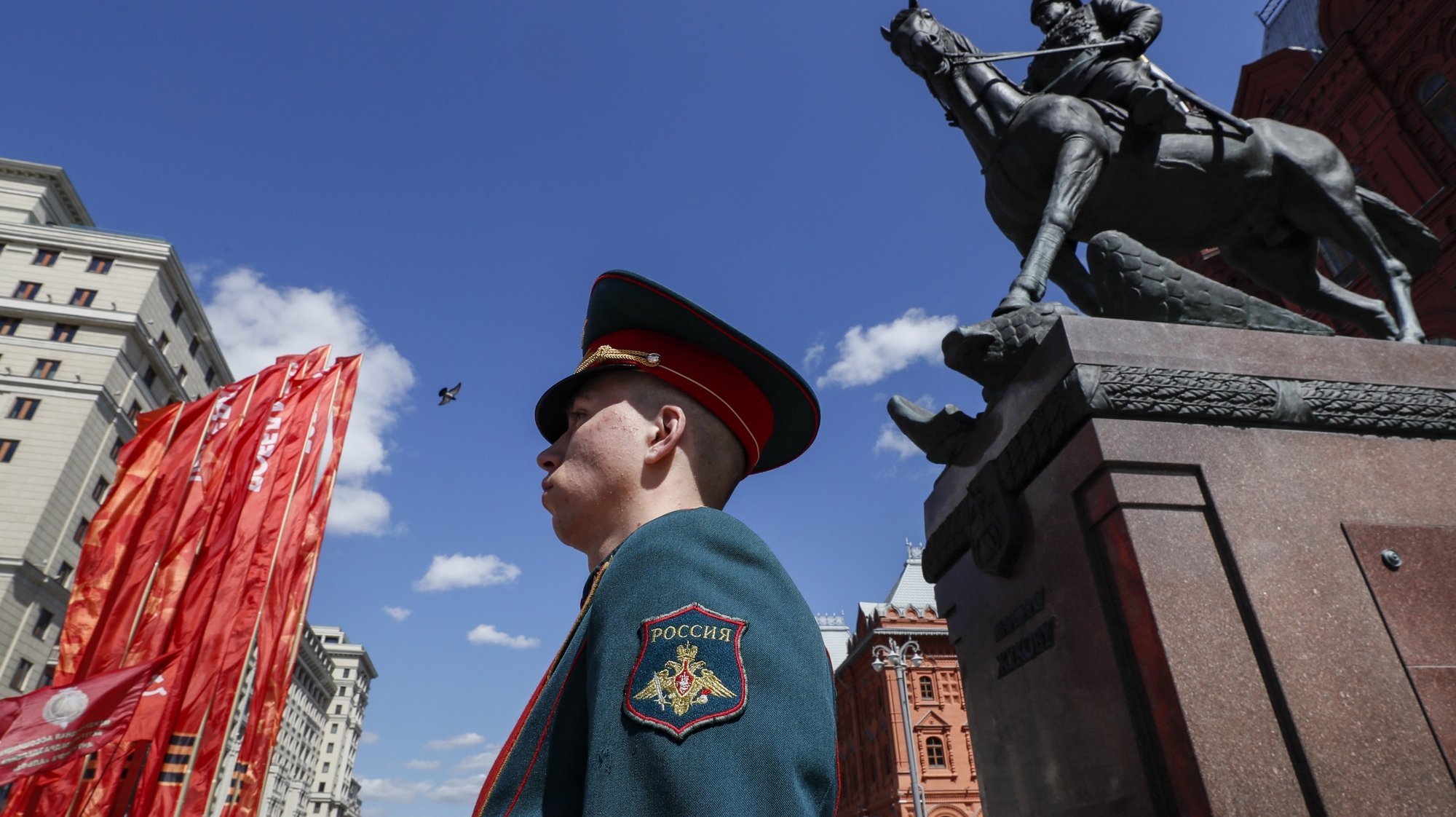 epa09928239 Russian serviceman in front of monument to Soviet Red Army marshal Georgy Zhukov near the Red Square upcoming the World War II Victory Day celebrations in Moscow, Russia, 05 May 2022. Russia preparing to celebrate Victory Day on 09 May to commemorate the victory of the Soviet Union&#039;s Red Army over Nazi-Germany in WWII.  EPA/YURI KOCHETKOV