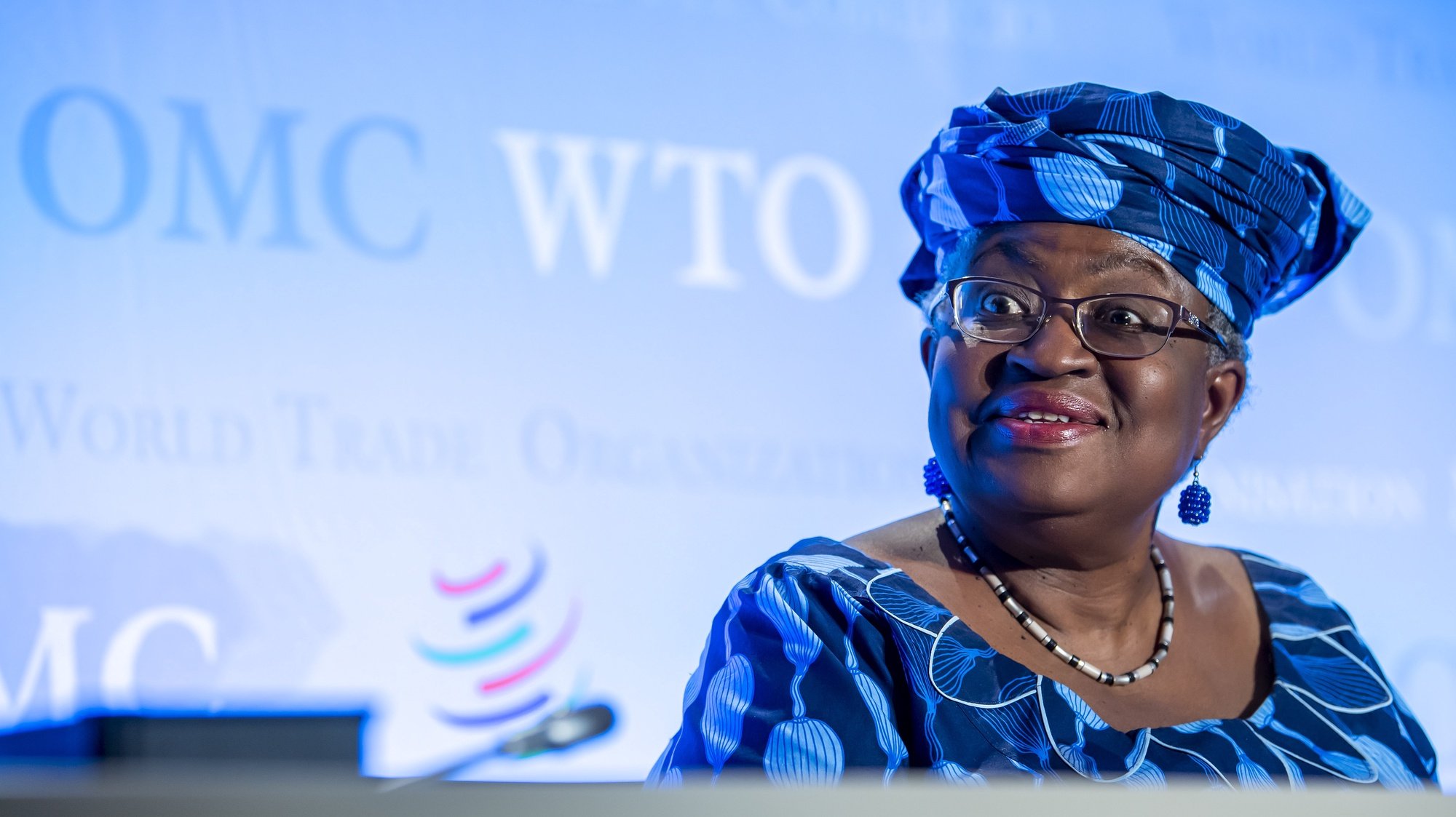 epa08547703 Ngozi Okonjo-Iweala, from Nigeria, candidate as Director General of the World Trade Organization (WTO), speaks during the press conferences of candidates for the WTO Director-General selection process, at the headquarters of the World Trade Organization (WTO), in Geneva, Switzerland, 15 July 2020.  EPA/MARTIAL TREZZINI