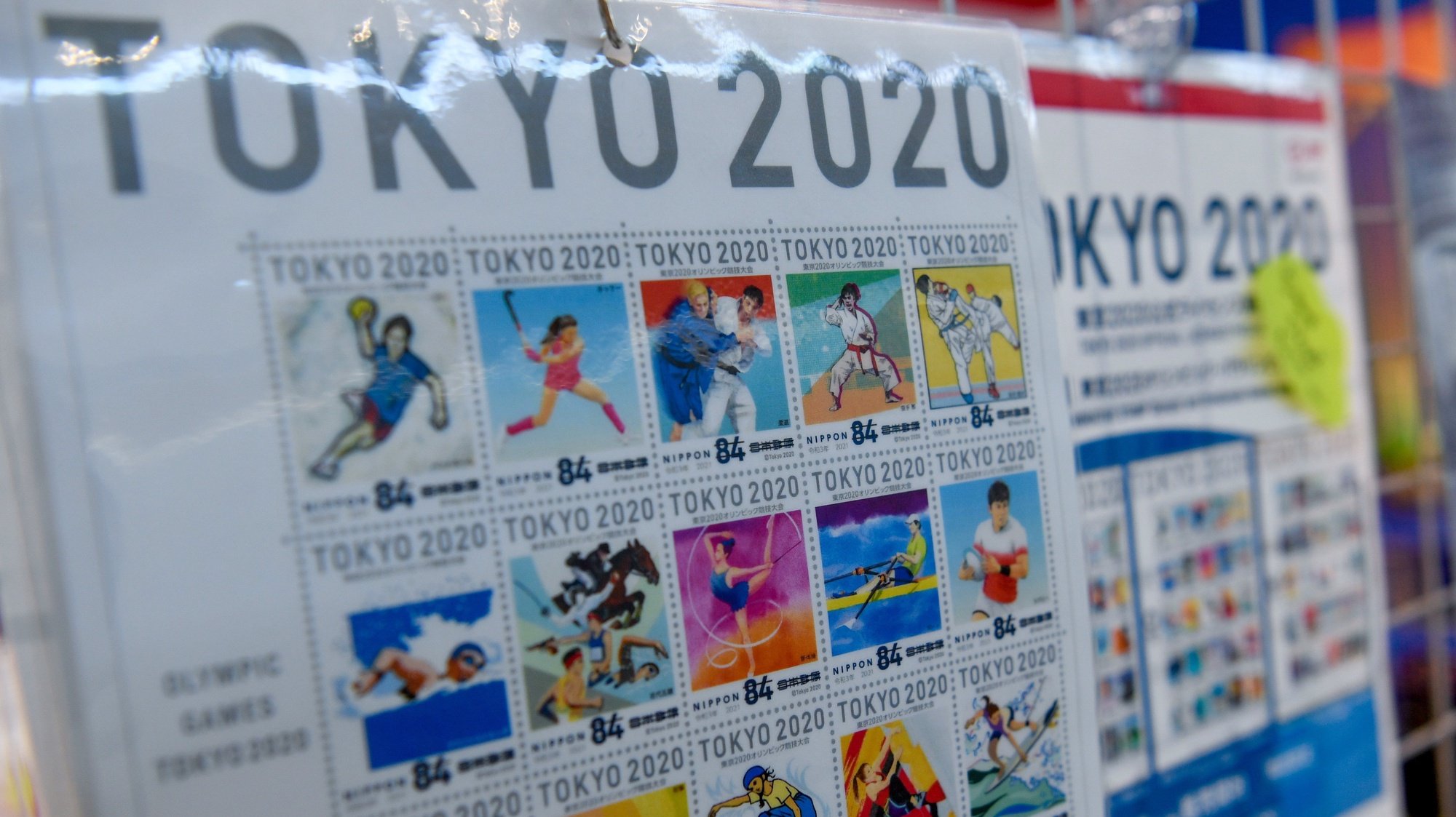 epa09356043 Olympic stamps are displayed at the Main Press Center in Tokyo, Japan, 21 July 2021. The pandemic-delayed 2020 Summer Olympics are schedule to open on July 23 with spectators banned from most Olympic events due to COVID-19 surge.  EPA/Zsolt Czegledi HUNGARY OUT