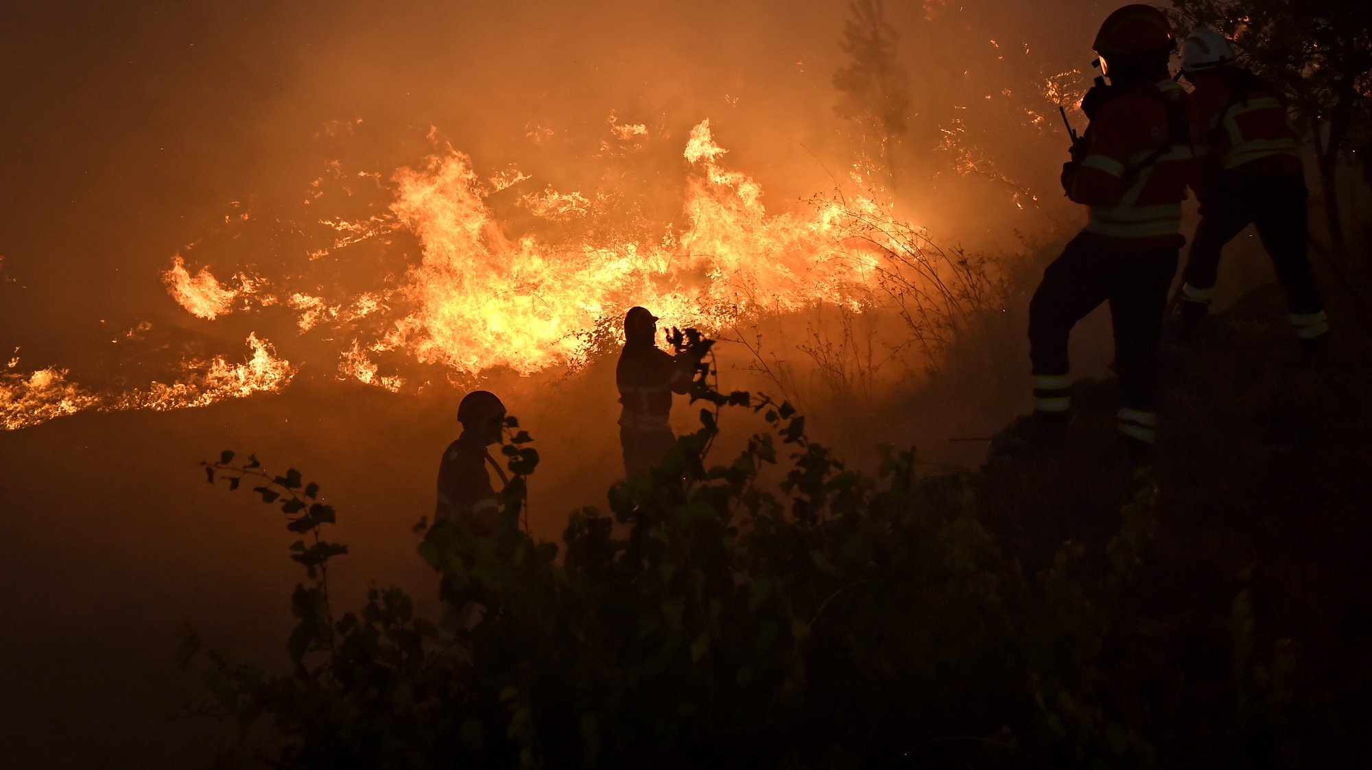 Firemen fight a forest fire in Vila Cortes do Mondego, Guarda, Portugal, 13 August 2022. In this moment 1262 operational and 375 vehicles are fighting the forest fire. NUNO ANDRÉ FERREIRA/LUSA