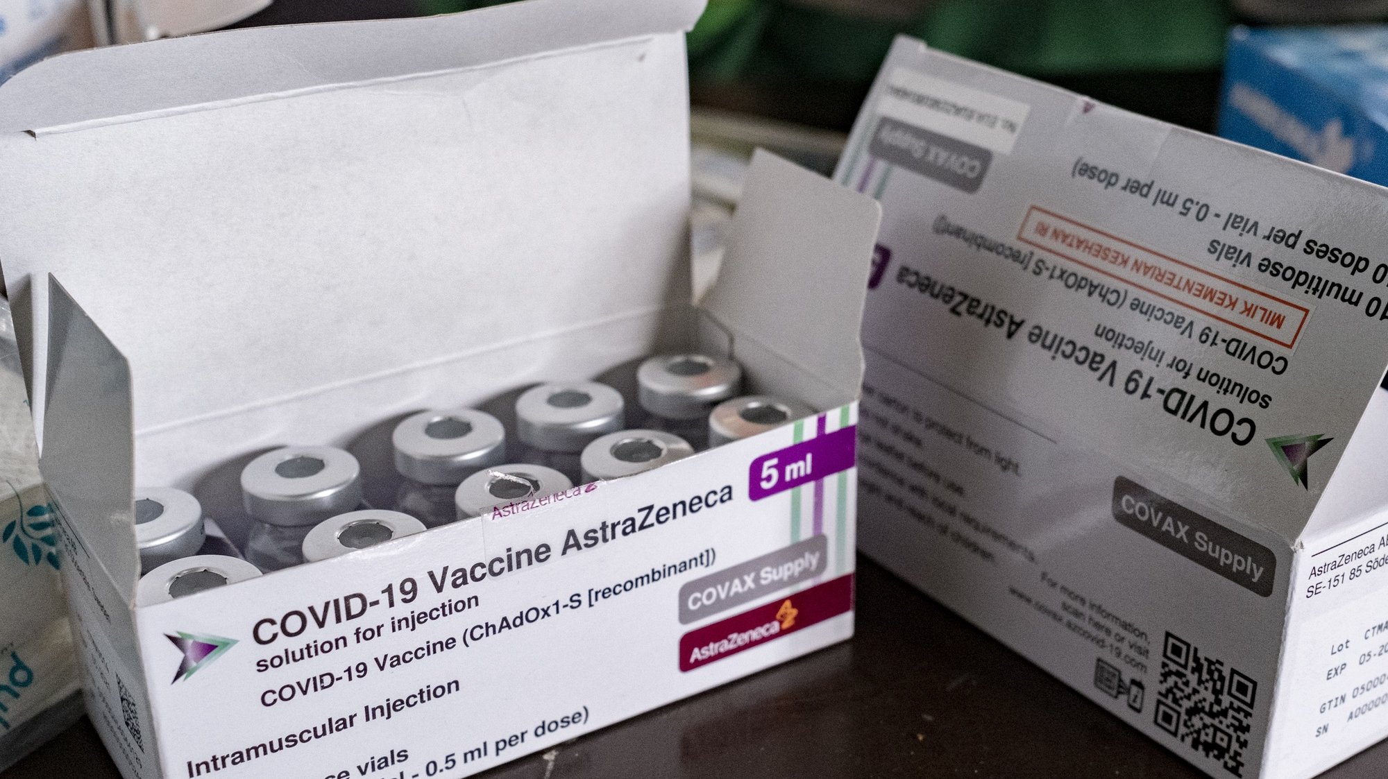 epa09098182 A pack of the AstraZeneca&#039;s COVID-19 vaccine vials sits on a table during a vaccination drive for military personnel in Denpasar, Bali, Indonesia, 26 March 2021.  EPA/MADE NAGI