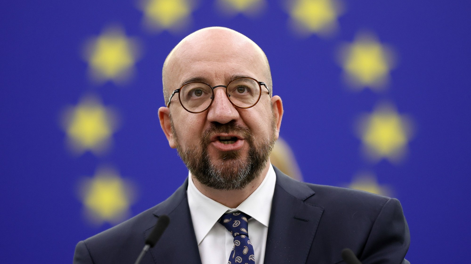 epa09873190 President of the European Council Charles Michel delivers a speech during a debate at the European Parliament in Strasbourg, France, 06 April 2022. The European Parliament on 06 April will review the results of the European Council held on 24 and 25 March, focusing on the latest developments of the war in Ukraine and the EU sanctions against Russia.  EPA/RONALD WITTEK