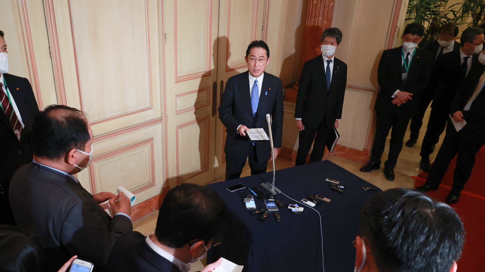 epa09845924 Japan&#039;s Prime Minister Fumio Kishida (C) speaks to reporters in Brussels, Belgium, 24 March 2022. Prime Minister Kishida strongly condemned North Korea’s launch of an intercontinental ballistic missile toward Japan earlier in the day. The missile fell in the Sea of Japan about 170 kilometers off the coast of Aomori Prefecture.  EPA/JIJI PRESS JAPAN OUT EDITORIAL USE ONLY/  NO ARCHIVES