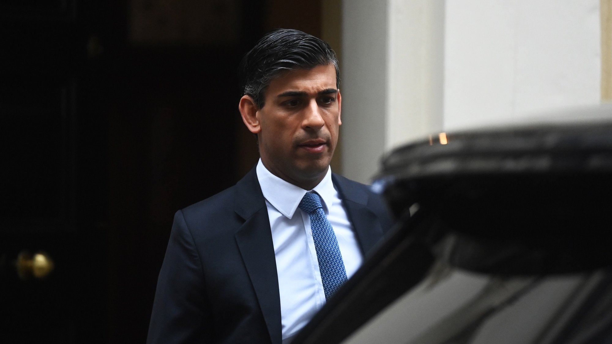 epa09937570 Britain&#039;s Chancellor of the Exchequer Rishi Sunak leaves Number 10 Downing Street in advance of the State Opening of Parliament in London, Britain, 10 May 2022. The British government is expected to promise to get the country &#039;back on track&#039; as the government unveils its plans for the year ahead in the Queen&#039;s Speech.  EPA/NEIL HALL