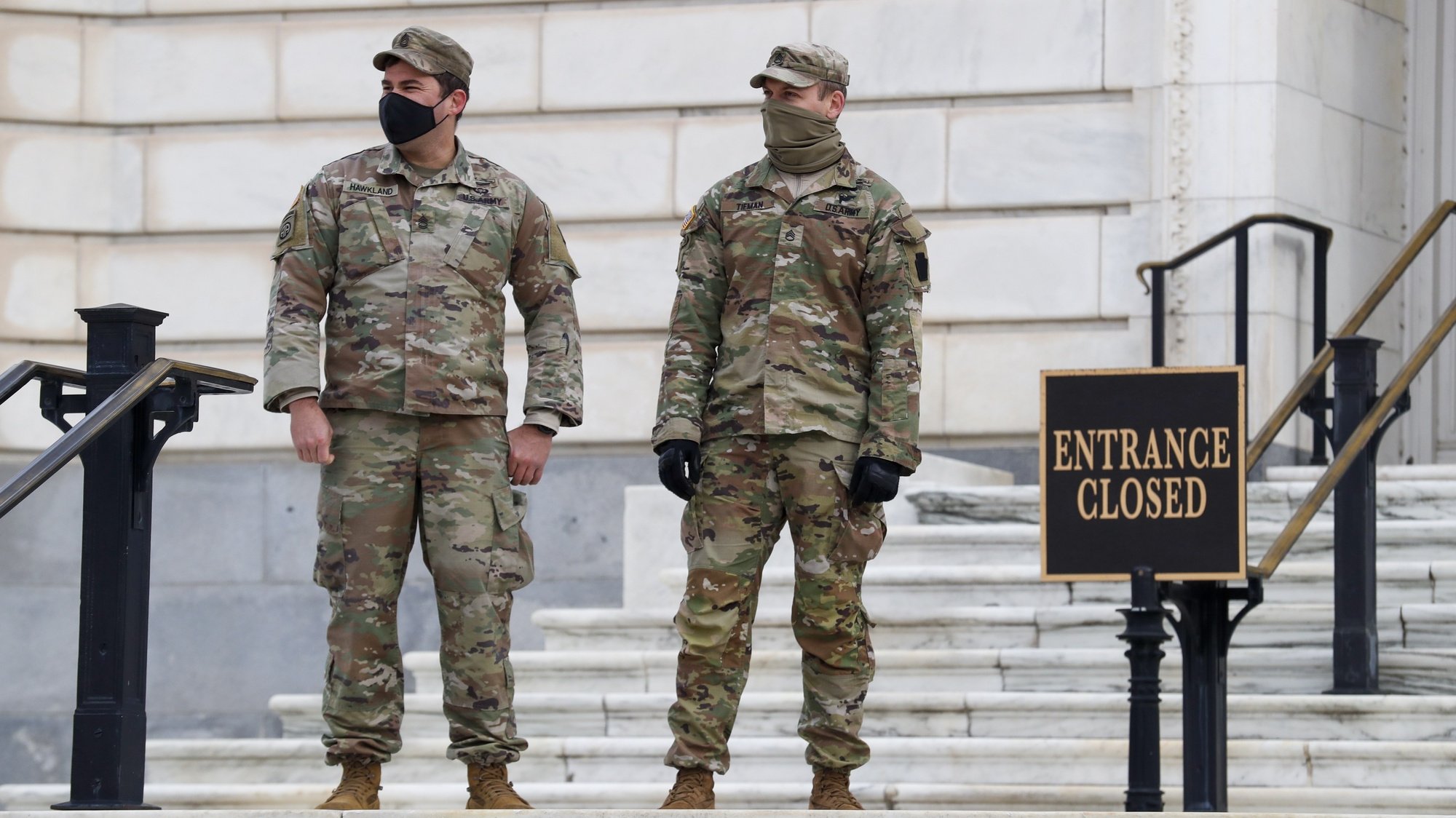 epa08931876 National Guard soldiers stand guard at the US Capitol in Washington, DC, USA, 11 January 2021. Speaker of the House Nancy Pelosi plans to introduce articles of impeachment against US President Donald J. Trump for incitement of insurrection following the attack on the US Capitol on 06 January as lawmakers worked to certify Joe Biden as the next President of the United States.  EPA/SHAWN THEW