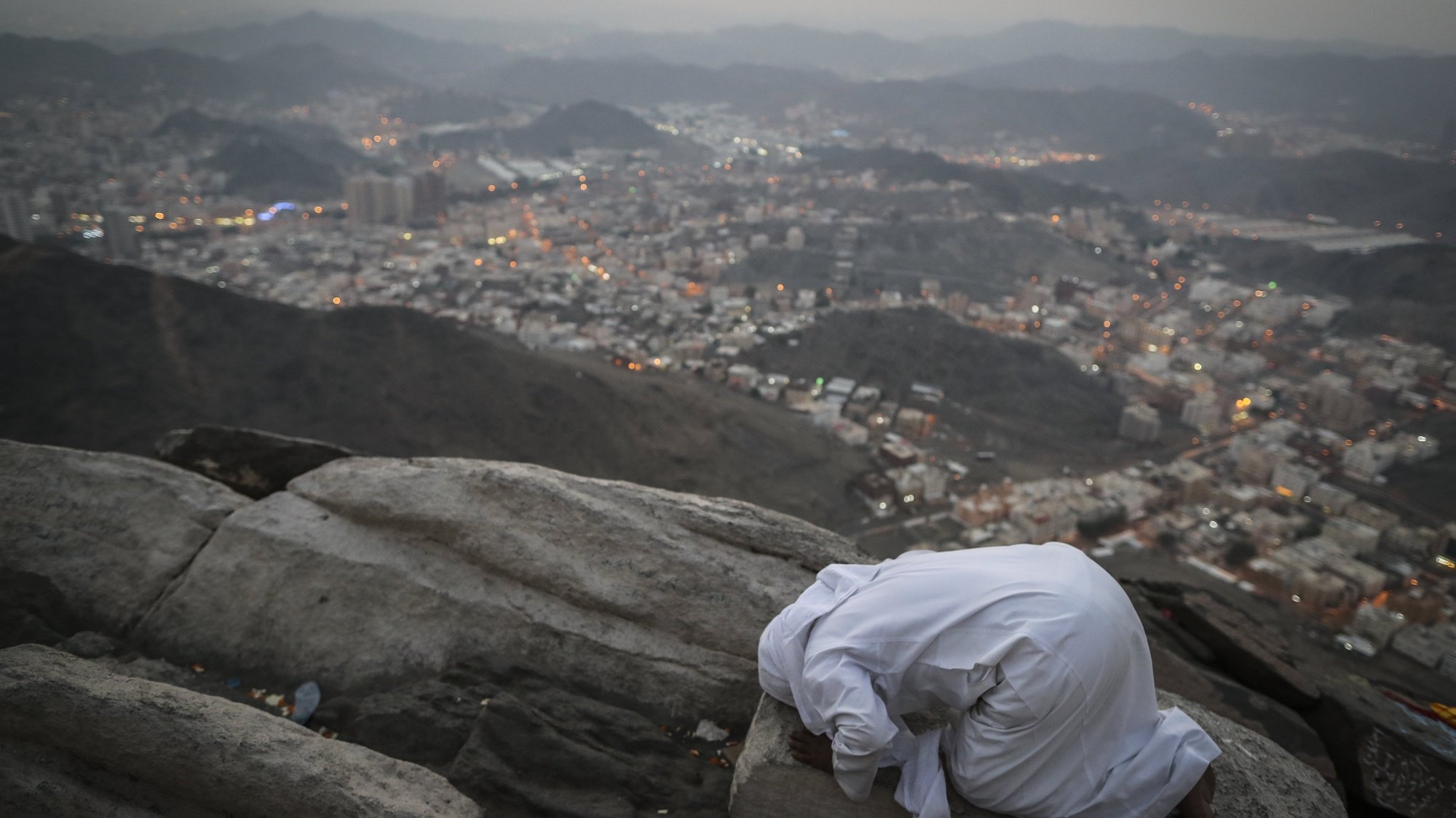 epaselect epa06169111 A Muslim worshipper prays on the top of Mount Al-Noor where the Prophet Muhammad received the first words of the Koran in Mecca, Saudi Arabia, 28 August 2017. Around 2.6 million muslims are expected to attend this year&#039;s Hajj pilgrimage, which is highlighted by the Day of Arafah, one day prior to Eid al-Adha. Eid al-Adha is the holiest of the two Muslims holidays celebrated each year, it marks the yearly Muslim pilgrimage (Hajj) to visit Mecca, the holiest place in Islam. Muslims slaughter a sacrificial animal and split the meat into three parts, one for the family, one for friends and relatives, and one for the poor and needy.  EPA/MAST IRHAM