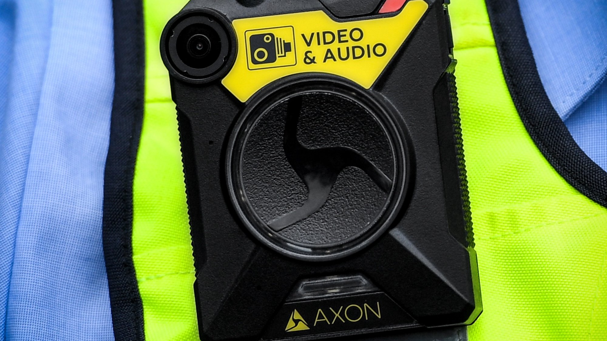 epa07868790 Police officers present new introduced bodycams (L) for North Rhine-Westphalian police in Cologne, Germany, 25 September 2019. The de-escalating effect of the bodycams is intended to protect police officers from attacks in patrol service.  EPA/SASCHA STEINBACH