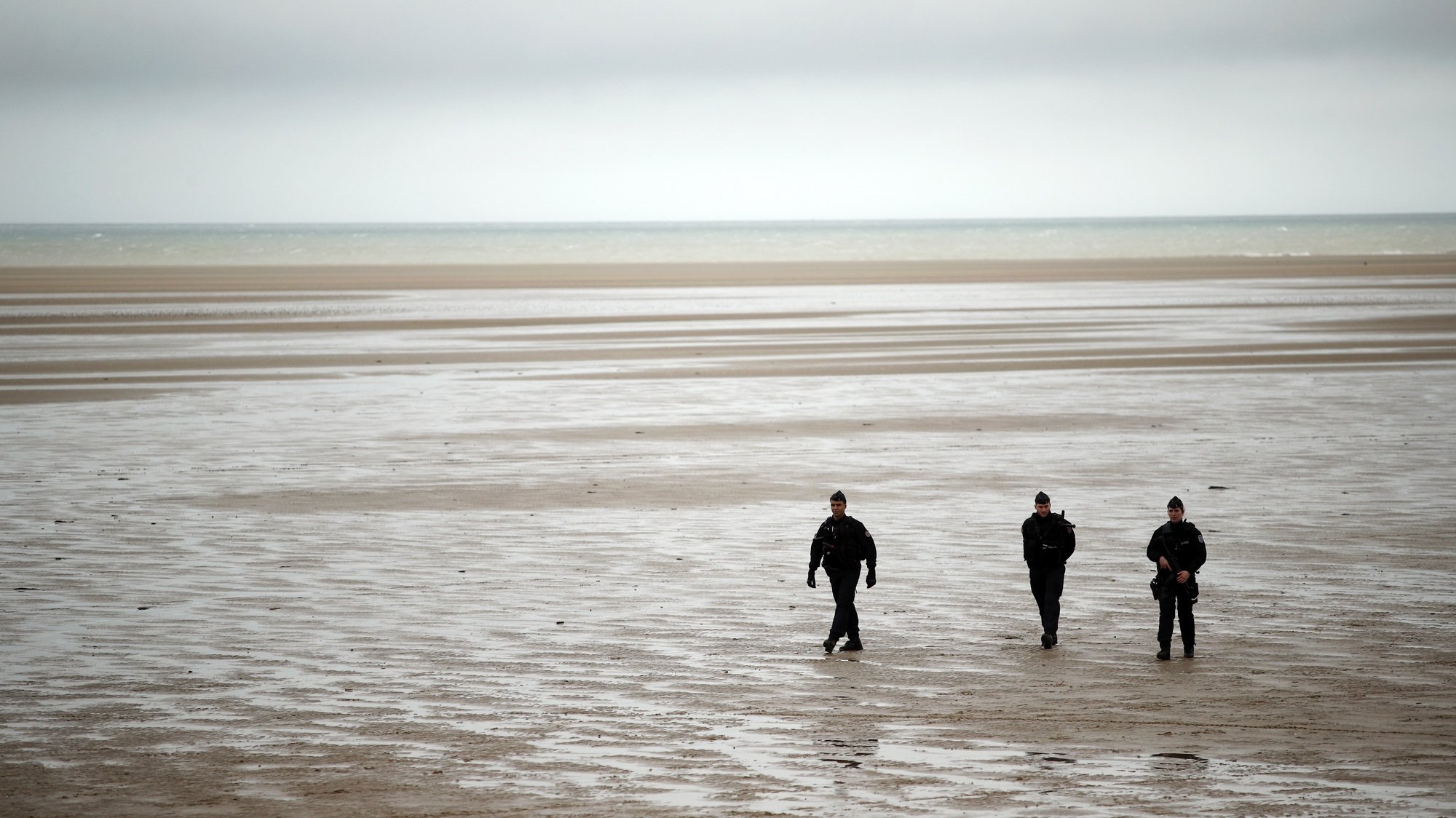 epa08181582 French police officers patrol at Oye-Plage, former site of the Jungle, near the Ferry Port in Calais, northern France, 31 January 2020, as part of a visit of French Interior Minister Christophe Castaner (not pictured) to local security forces. Britain is due to leave the European Union on 31 January 2020.  EPA/YOAN VALAT