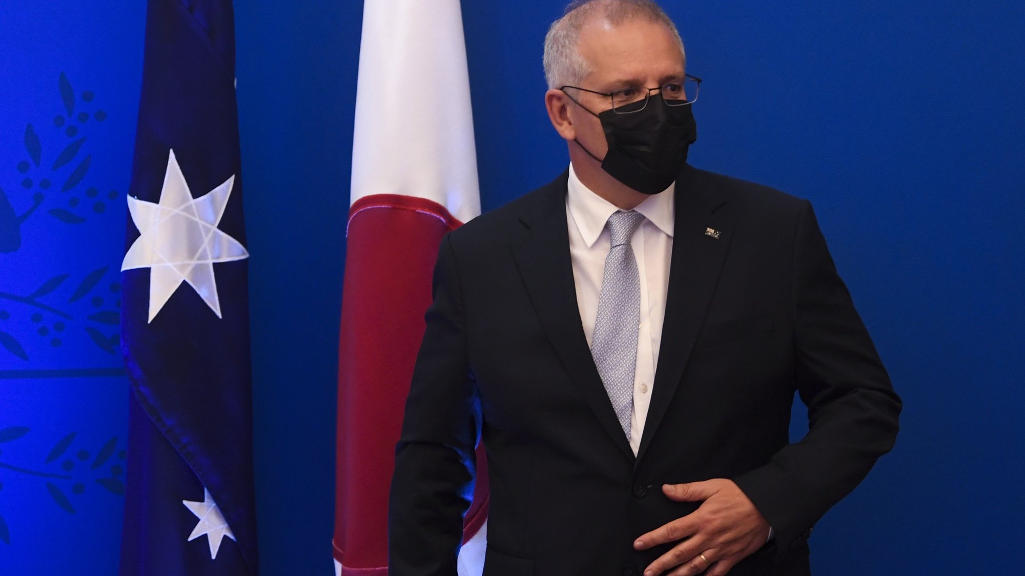 epa09668922 Australian Prime Minister Scott Morrison ahead of a virtual treaty signing summit with Japanese Prime Minister Fumio Kishida, at Parliament House, in Canberra, Australia, 06 January 2022. The meeting between Morrison and Kishida will outline a framework for future defence cooperation in the region.  EPA/LUKAS COCH  AUSTRALIA AND NEW ZEALAND OUT
