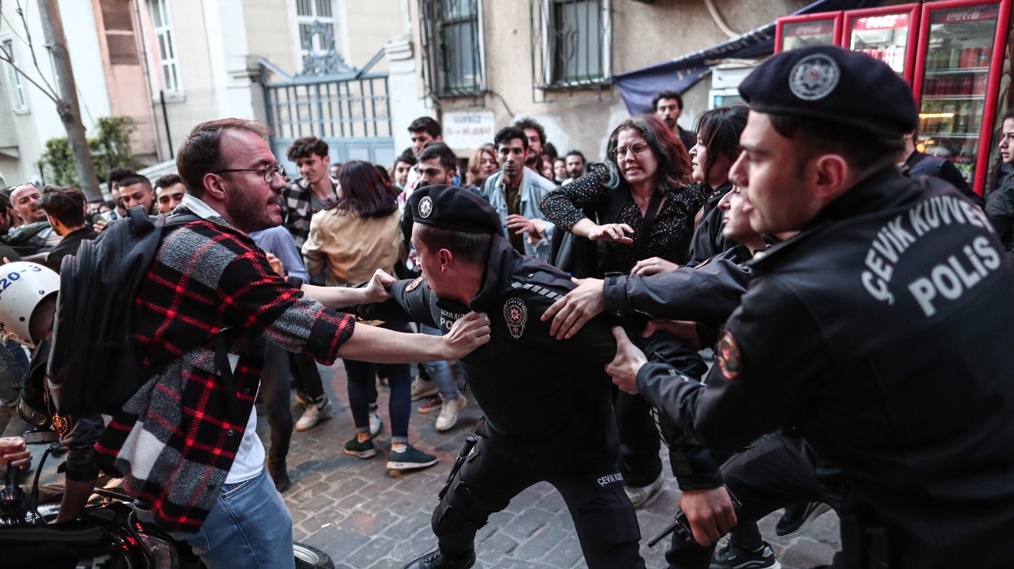 epa09910617 Protesters and riot police clash during the protest in support of the jailed Turkish businessman and philanthropist Osman Kavala, near Taksim Square in Istanbul, Turkey, 26 April 2022. A Turkish court handed civil rights activist Osman Kavala a life sentence and also sentenced seven other defendants, including 71-year-old architect Mucella Yapici, to 18 years in prison.  EPA/SEDAT SUNA
