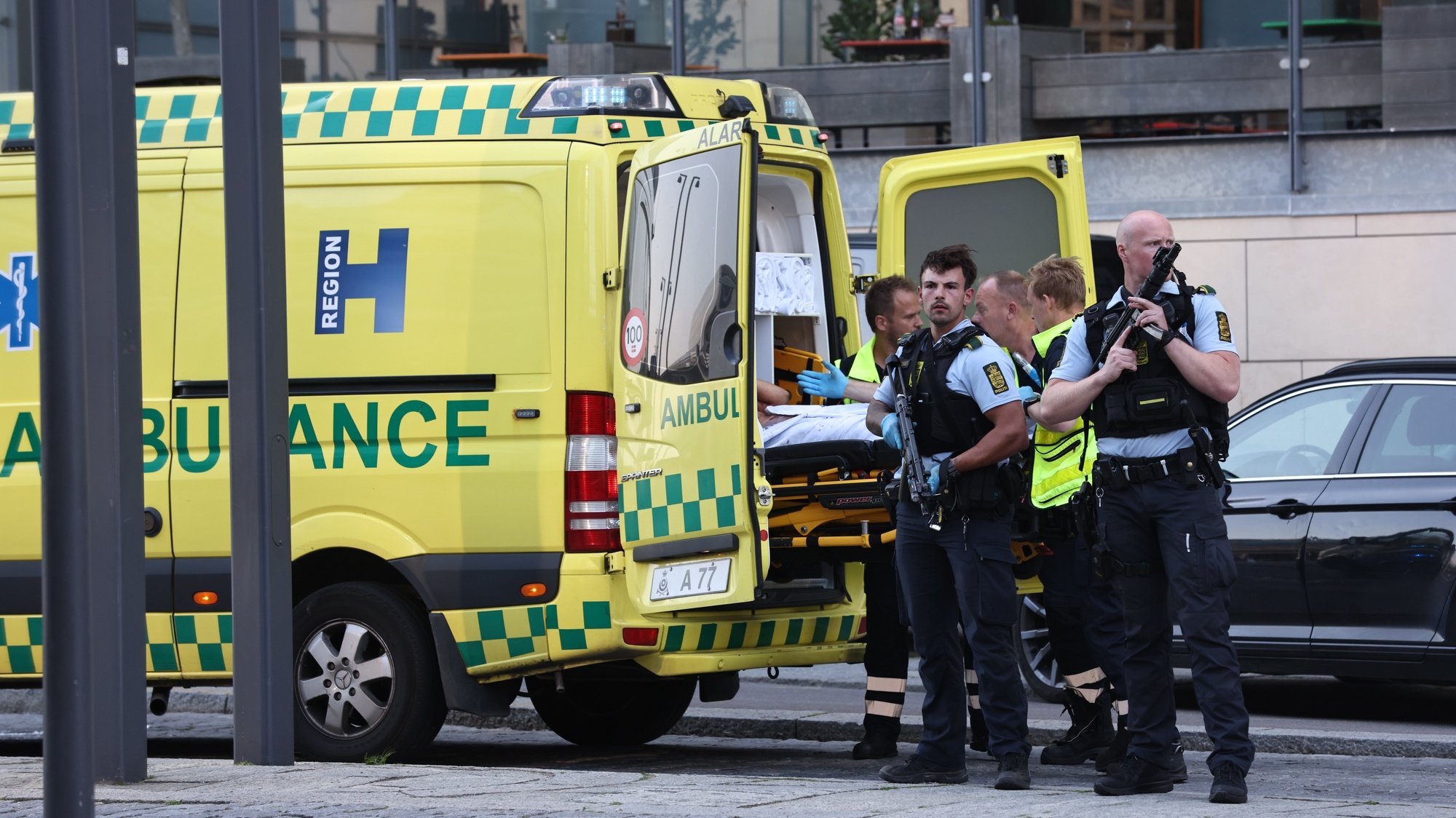 epa10050021 An ambulance and armed police gather outside shopping center Field&#039;s in Copenhagen, Denmark, 03 July 2022. Danish Police has confirmed that shots were fired inside and that several people are injured.  EPA/Olafur Steinar Gestsson  DENMARK OUT