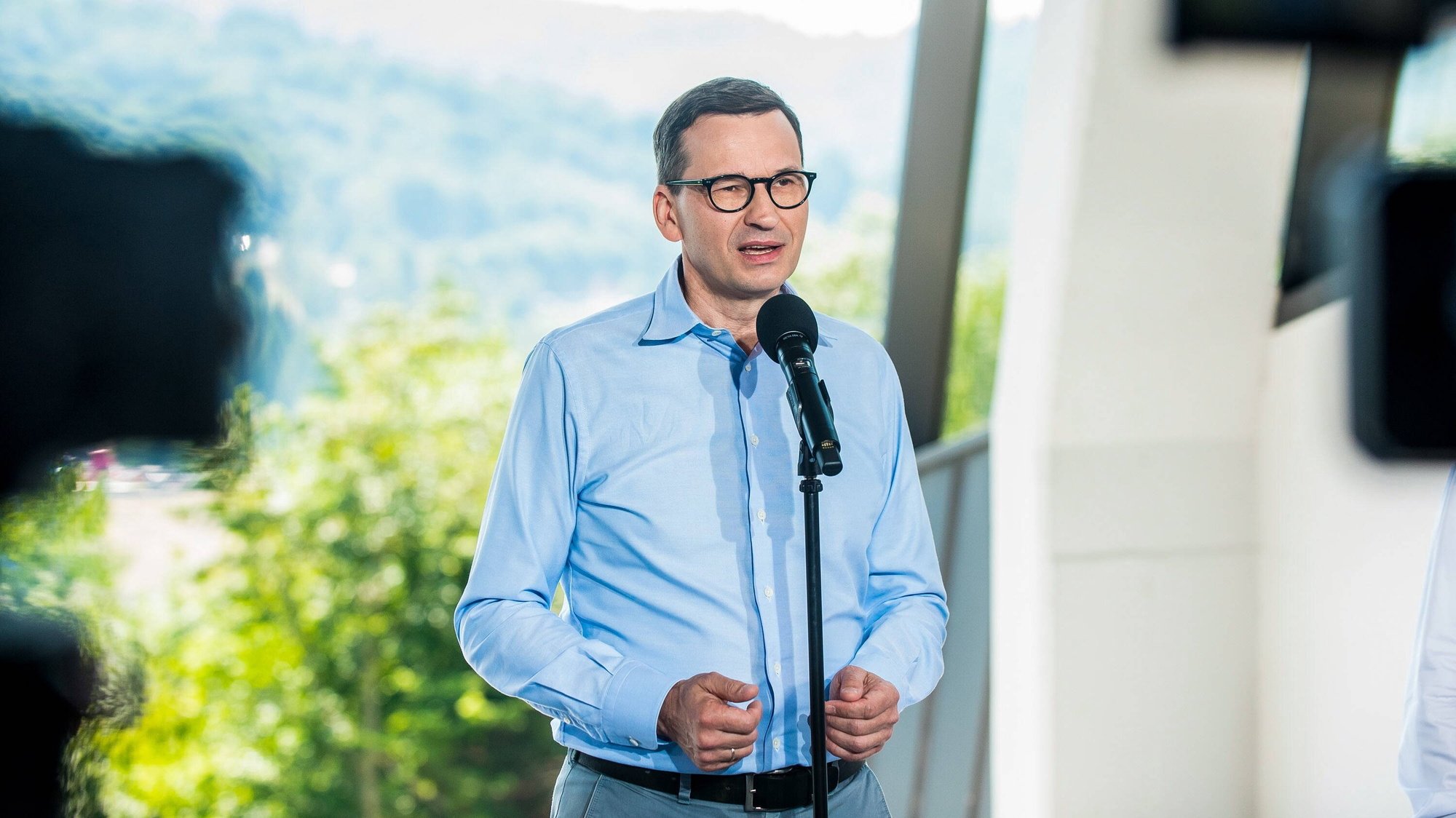 epa10046099 Polish Prime Minister Mateusz Morawiecki speaks during the opening of the gondola lift in Solina, Poland, 01 July 2022. The length of the cable railway is 1600 meters, from the Plasza station to the Jawor station, where the observation tower and the theme park are situated.  EPA/Art Service 2 POLAND OUT