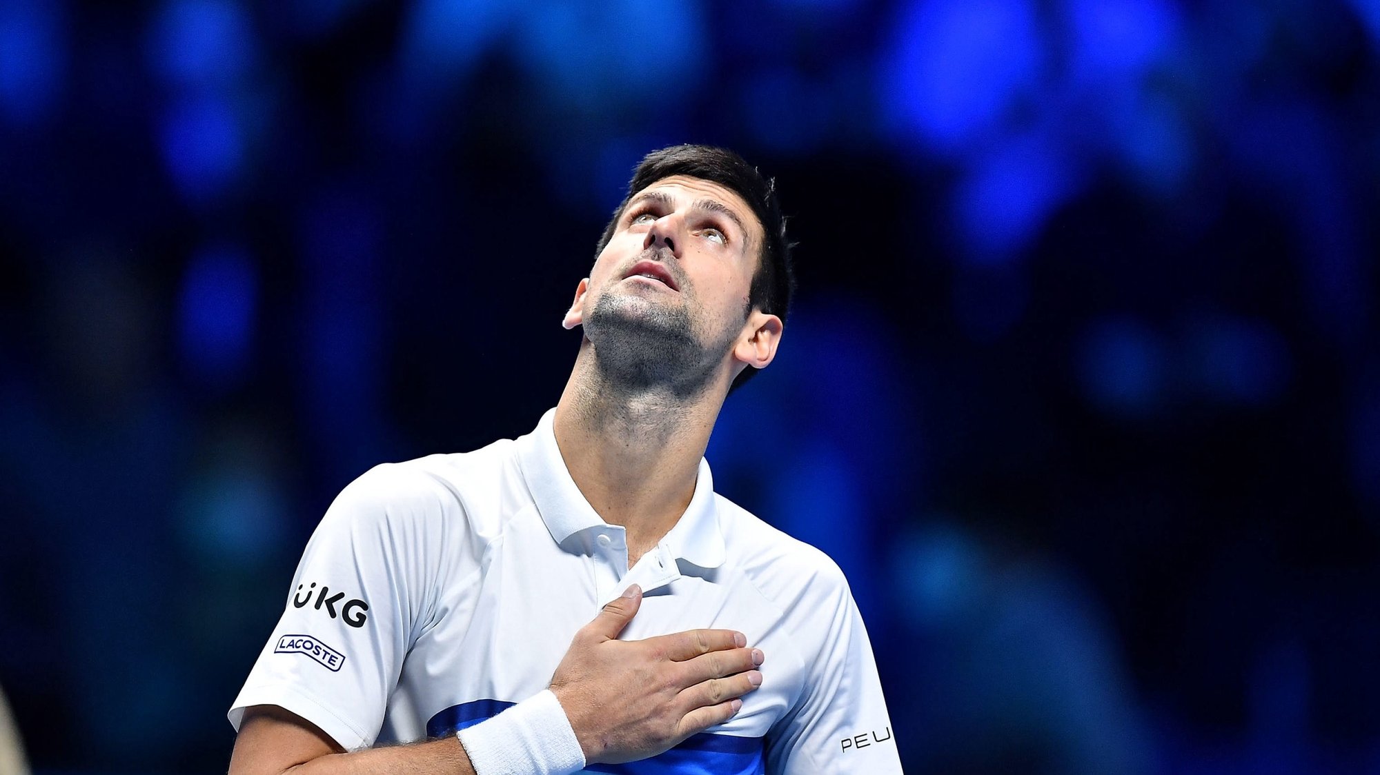 epa09688749 (FILE) - Novak Djokovic of Serbia reacts after defeating Casper Ruud of Norway in their group stage match of the Nitto ATP Finals tennis tournament in Turin, Italy, 15 November 2021 (reissued 16 January 2022). Djokovic lost court appeal against deportation from Australia and will not be able to defend his Australian Open title in Melbourne.  EPA/Alessandro Di Marco *** Local Caption *** 57295242