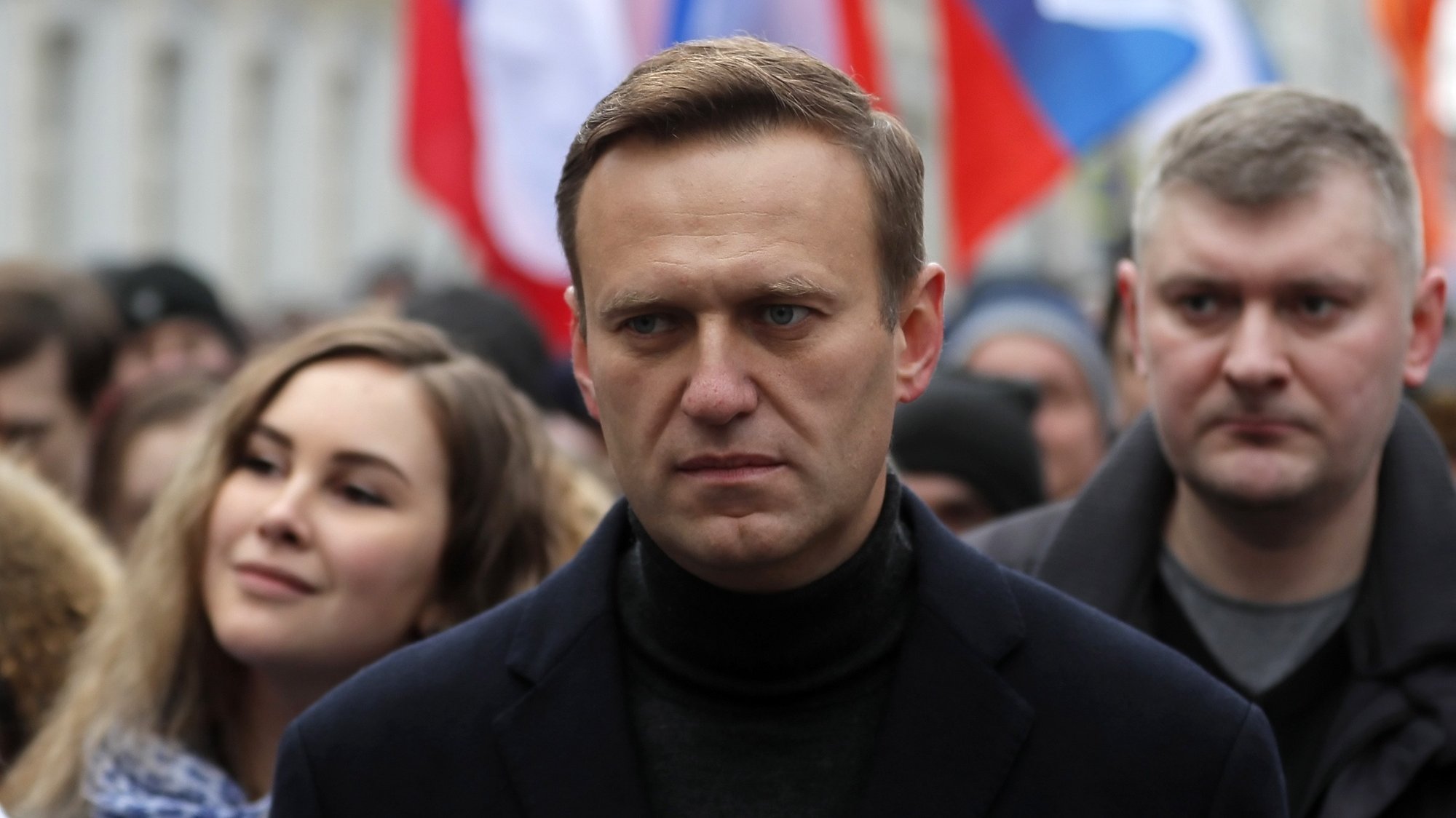 epa08934351 (FILE) - Russian opposition leader and anti-corruption activist Alexei Navalny (C) takes part in a memorial march for Boris Nemtsov marking the fifth anniversary of his assassination in Moscow, Russia, 29 February 2020 (reissued 13 January 2021). Navalny on 13 January 2021 stated on his Twitter account that he plans to travel to Moscow on Sunday, 17 January 2021.  EPA/YURI KOCHETKOV *** Local Caption *** 56313826
