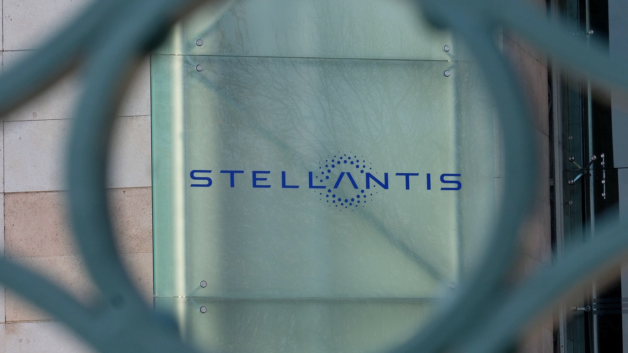 epa08943862 The &quot;Stellantis&quot; sign posted at the main entrance of the Fiat Mirafiori building in Turin, Italy, 17 January 2021. Fiat-Chrysler (FCA) and Groupe PSA sealed a 38 billion US dollar merger on 16 January 2021 to create Stellantis, the world&#039;s fourth-largest auto group.  EPA/ALESSANDRO DI MARCO