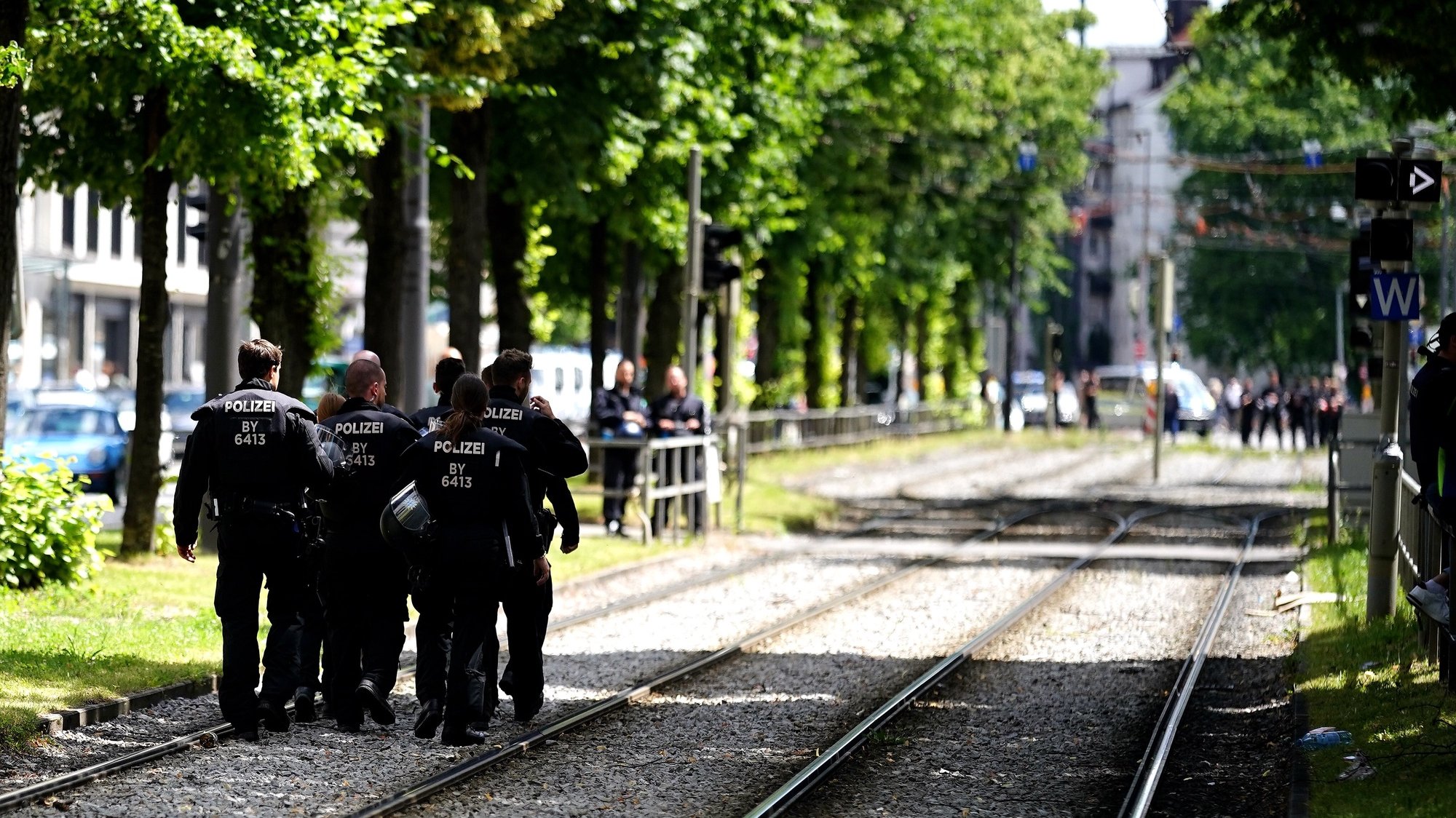 epa10033404 Police officers patrol during a demonstration related to the G7 Summit in Munich, Germany, 25 June 2022. Germany is hosting the G7 summit at Elmau Castle near Garmisch-Partenkirchen from 26 to 28 June 2022.  EPA/CLEMENS BILAN