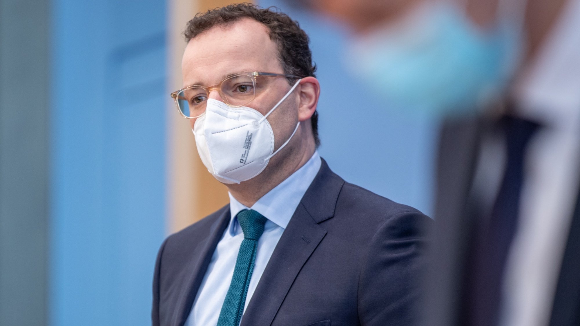 epa08957379 Jens Spahn, German Minister of Health at Federal Press Conference on pandemic Corona situation in lockdown in Berlin, Germany, 22 January 2021. According to Robert Koch Institute, the German federal agency for disease control, the number of people who died with coronavirus surpassed 50,000 in Germany since the start of the pandemic. However, number of infected people began to drop in the country, which is currently in lockdown until 14 February, with total infections of more than 2.1 million.  EPA/ANDREAS GORA / POOL