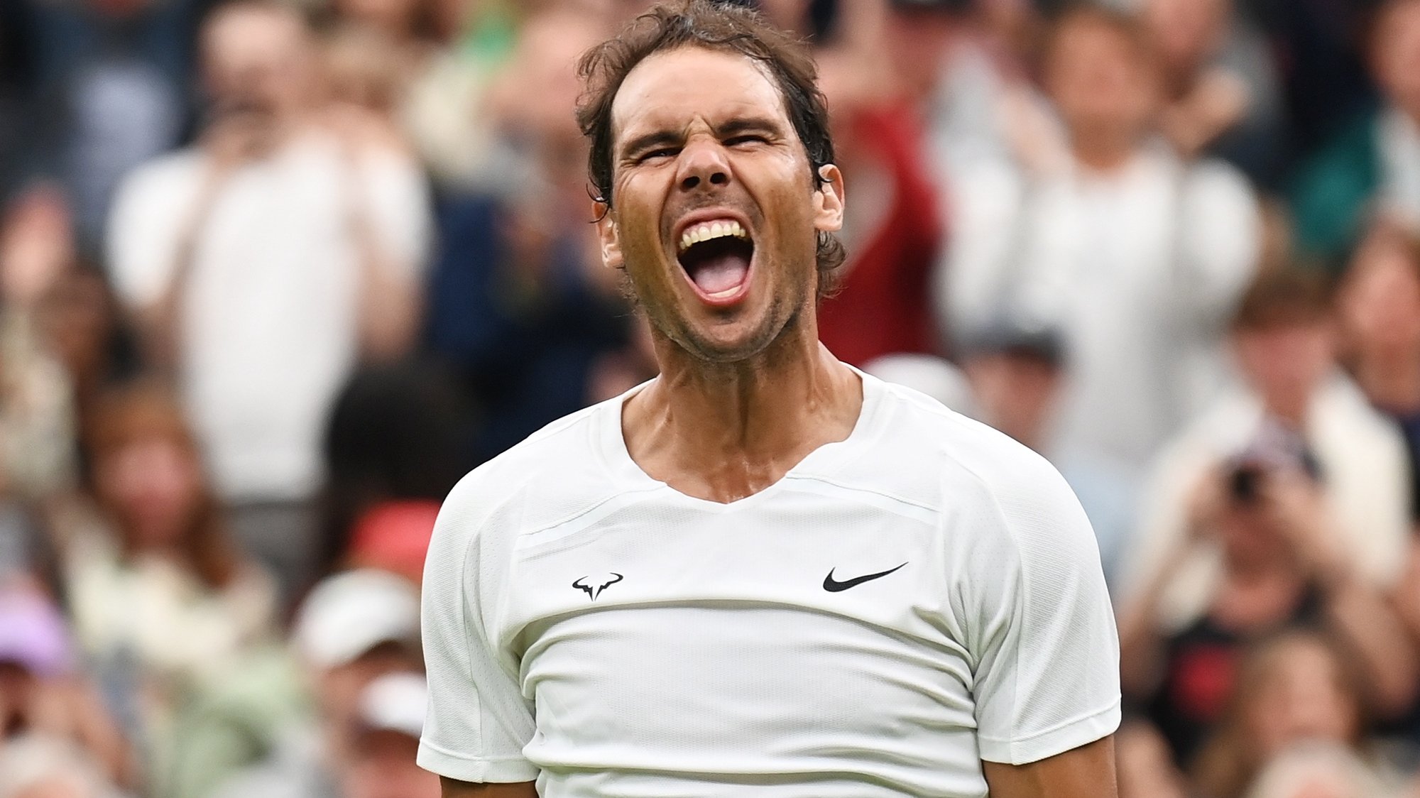 epa10044368 Rafael Nadal of Spain celebrates winning the men&#039;s second round match against Ricardas Berankis of Lithuania at the Wimbledon Championships, in Wimbledon, Britain, 30 June 2022.  EPA/NEIL HALL   EDITORIAL USE ONLY