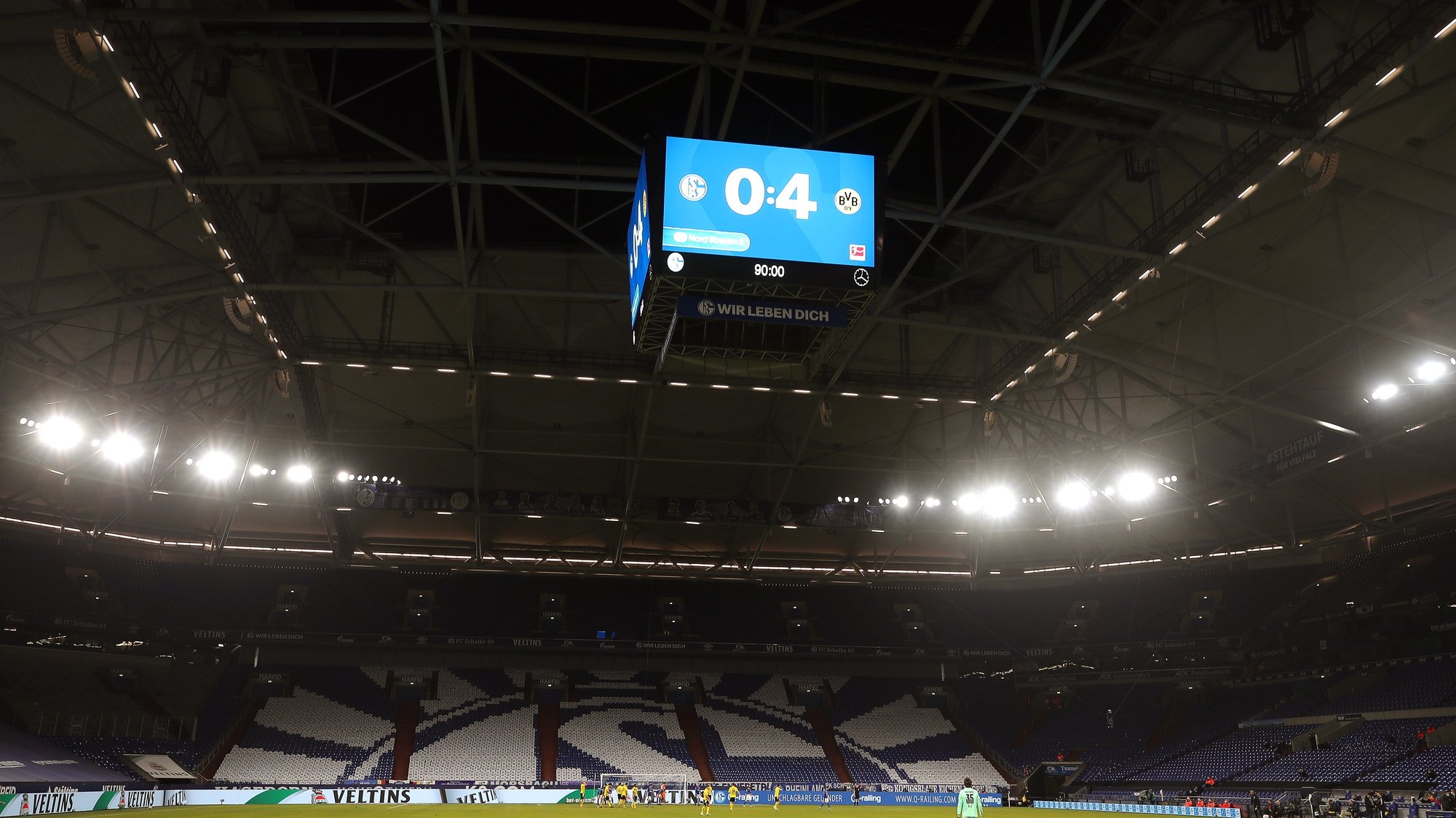 epa09026778 The final score is displayed on a huge screen at the Veltins-Arena at the end of the German Bundesliga soccer match between FC Schalke 04 and Borussia Dortmund in Gelsenkirchen, Germany, 20 February 2021. Dortmund won 4-0.  EPA/Lars Baron / POOL CONDITIONS - ATTENTION: The DFL regulations prohibit any use of photographs as image sequences and/or quasi-video.