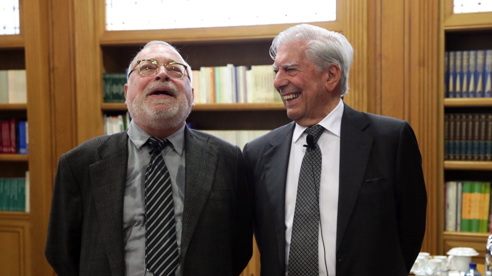 epa06774345 Peruvian writer Mario Vargas Llosa (R) and Spanish philosopher Fernando Savater (L) attend the inauguration of the Deliberar Institute talks in Madrid, Spain, 30 May 2018.  EPA/ZIPI