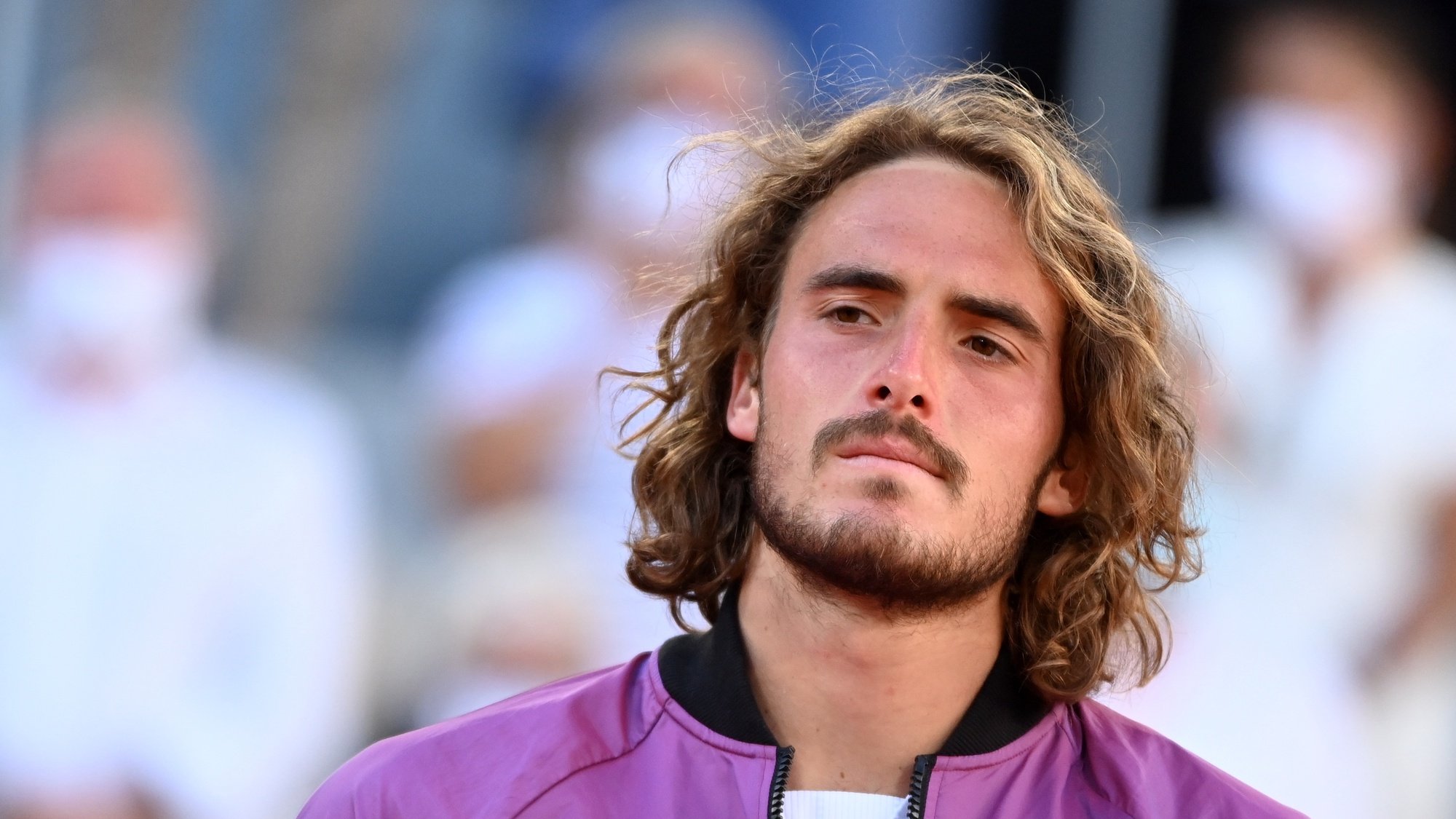 epa09268309 Stefanos Tsitsipas of Greece reacts after losing against Novak Djokovic of Serbia during their final match at the French Open tennis tournament at Roland Garros in Paris, France, 13 June 2021.  EPA/CAROLINE BLUMBERG