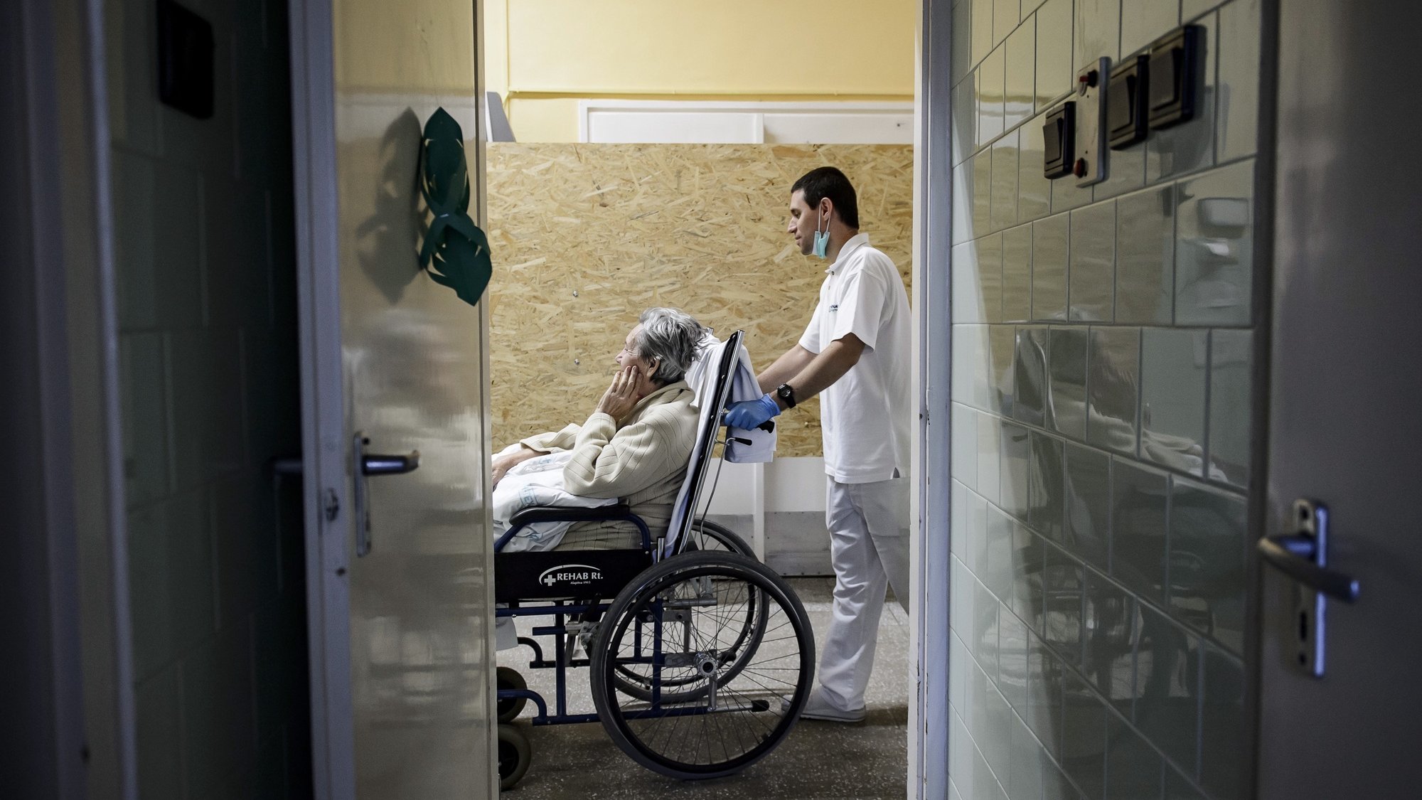 epa07912399 A healthcare professional takes and elderly lady in a wheelchair in the Hospice Department of Markhot Ferenc Hospital in Eger, northern Hungary, 27 September 2019 (issued 11 October 2019). World Hospice and Palliative Care Day is observed annually on the second Saturday of October, which falls on 12 October this year with the motto &#039;My care is my right.&#039; The first such event was organised in 2005 by a committee of the Worldwide Palliative Care Alliance, a wordwide network of hospice and palliative care organisations to draw attention to the needs of people who have been impacted by a life-limiting illness. Hospices operate to alleviate the pain and lessen the mental suffering of terminally ill patients while focusing on humane treatment and the protection of personal dignity. In Hungary, the foundraising events dedicated to the development of the hospice professsion on this special day are co-ordinated by the Hungarian Hospice-Palliative Association, which has been providing care for incurable cancer patients in Budapest since 1991.  EPA/PETER KOMKA HUNGARY OUT - ATTENTION: This Image is part of a PHOTO SET