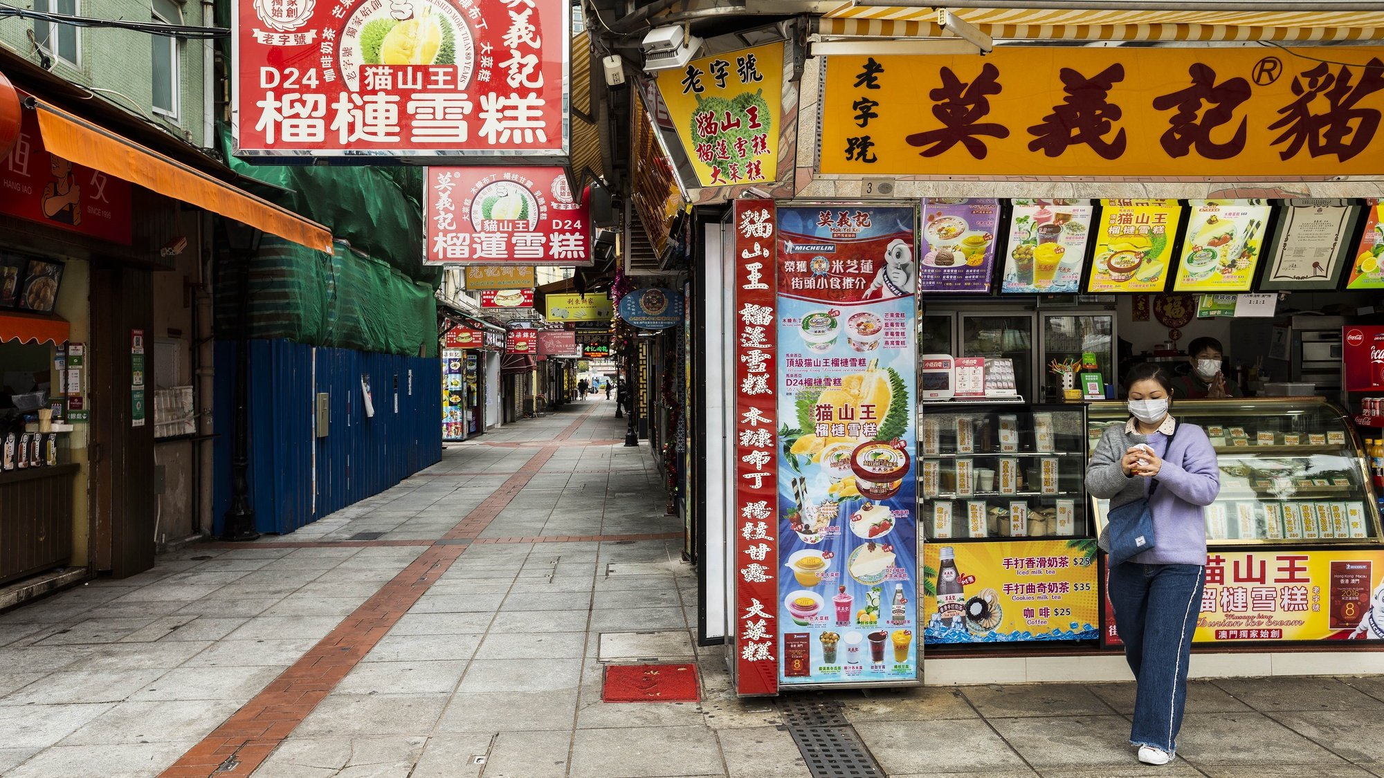 An open food store in an empty street in Macao, China, 07 February 2020. The coronavirus outbreak is contaminating local Portuguese businesses in Macao, robbing customers and hoping to recover, in some cases, the financial health that protests in Hong Kong had already compromised. CARMO CORREIA/LUSA
