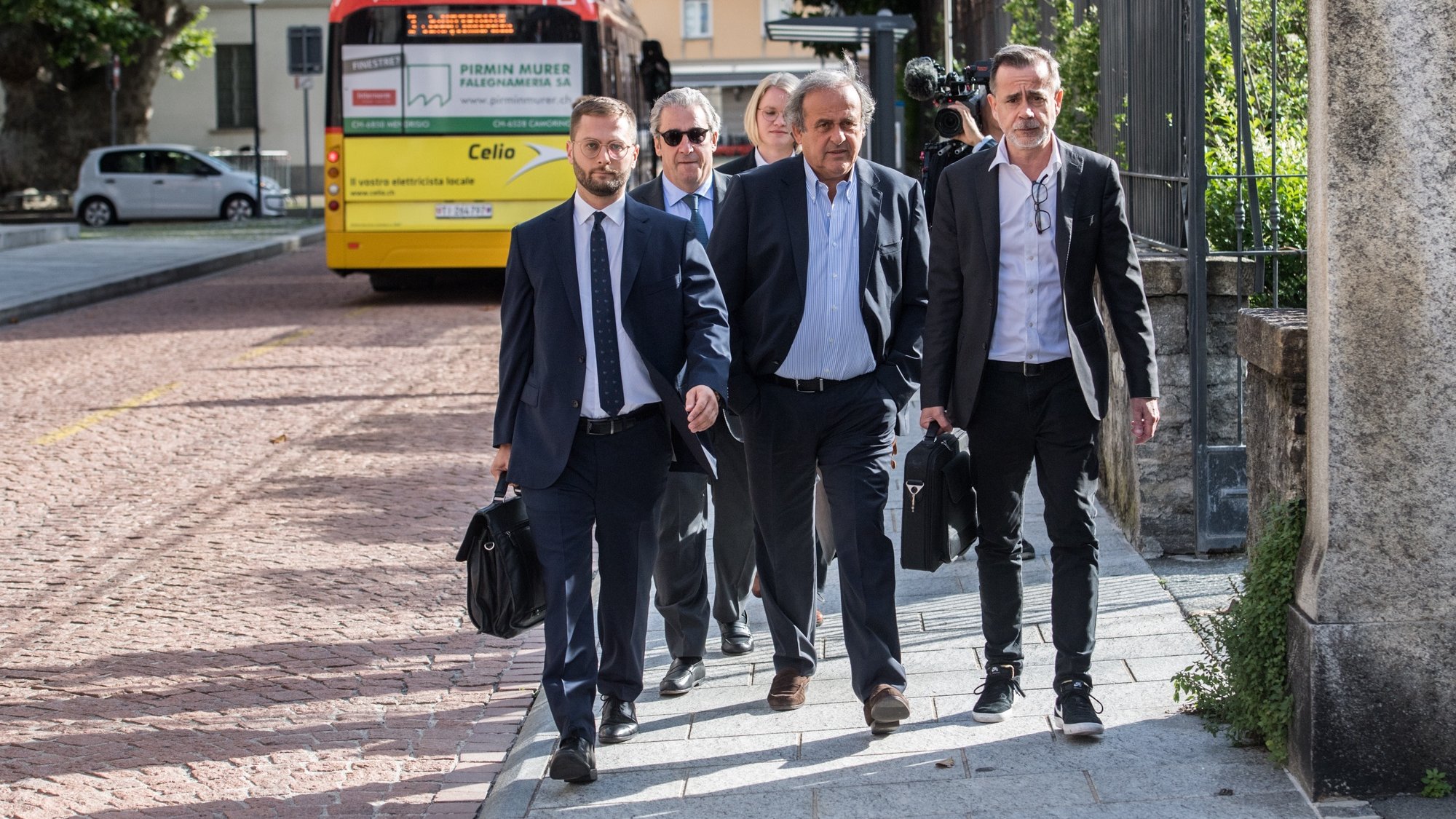 epa10001424 The former president of the the European Football Association (Uefa), Michel Platini (C), and his lawyers arrive to the process at the Swiss Federal Criminal Court in Bellinzona, Switzerland, 08 June 2022. Platini and the former president of the World Football Association (Fifa), Joseph Blatter, will stand trial before the Federal Criminal Court from 08 June, over a suspicious two-million payment. The Federal Prosecutor&#039;s Office accuses them of fraud. The defense speaks of a conspiracy.  EPA/ALESSANDRO CRINARI