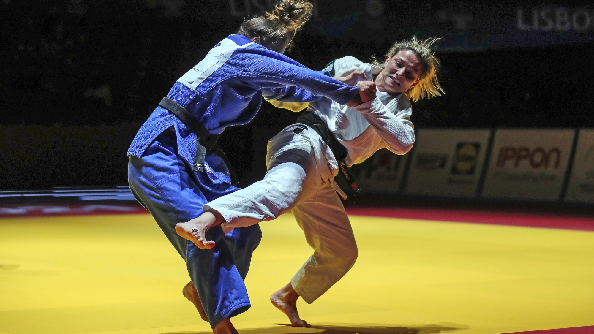 Telma Monteiro of Portugal (white) and Kaja Kajzer of Slovenia (blue) in action during the gold medal match in the woman&#039;s -57kg category at the European Judo Championships in Lisbon, Portugal, 16 April 2021. NUNO VEIGA/LUSA