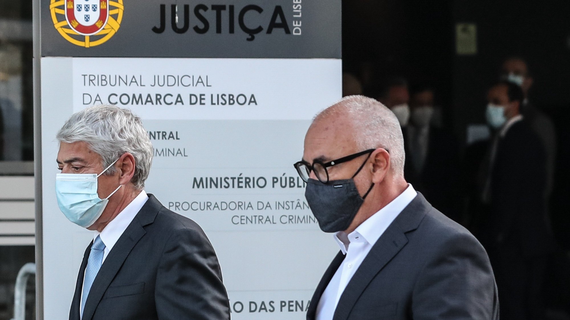 The defendant and former Prime Minister Jose Socrates (L) and his lawyer Pedro Delille (R) leave the court after the reading of the instructional decision of the high-profile corruption case known as Operation Marques, at the Justice Campus in Lisbon, Portugal, 09 April 2021. Operation Marques has 28 defendants - 19 people and 9 companies - including former Prime Minister Jose Socrates, banker Ricardo Salgado, businessman and friend of Socrates Carlos Santos Silva, and senior executives of Portugal Telecom, and is related to crimes of active and passive corruption, money laundering, document forgery, and tax fraud.  ANTÓNIO COTRIM/LUSA