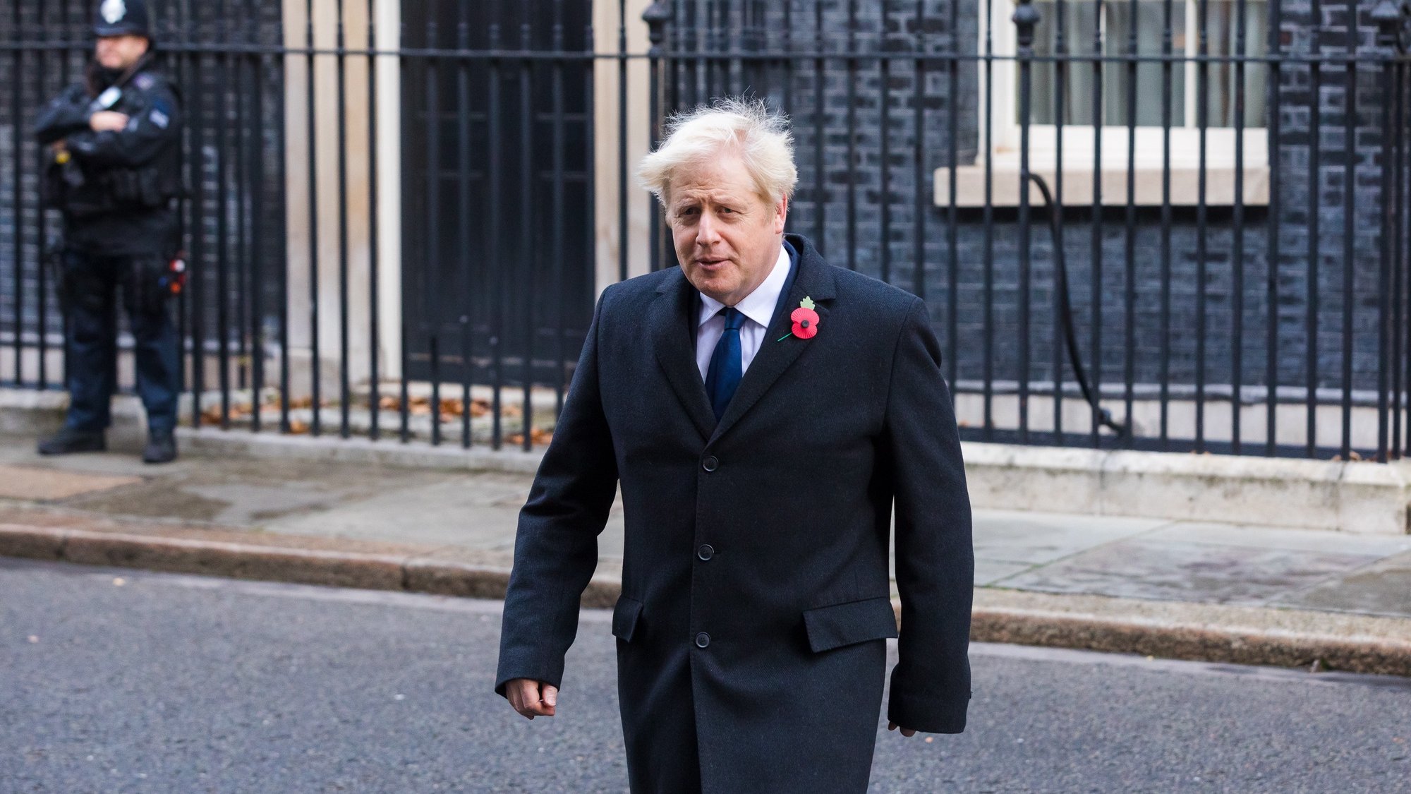 epa08807106 Britain&#039;s Prime Minister Boris Johnson (R) departs Downing Street to attend the National Service of Remembrance, on Remembrance Sunday, at The Cenotaph in Westminster, London, Britain, 08 November 2020. Remembrance Sunday events are held across the country as the UK remembers and honours those who have sacrificed themselves in two world wars and other conflicts.  EPA/VICKIE FLORES