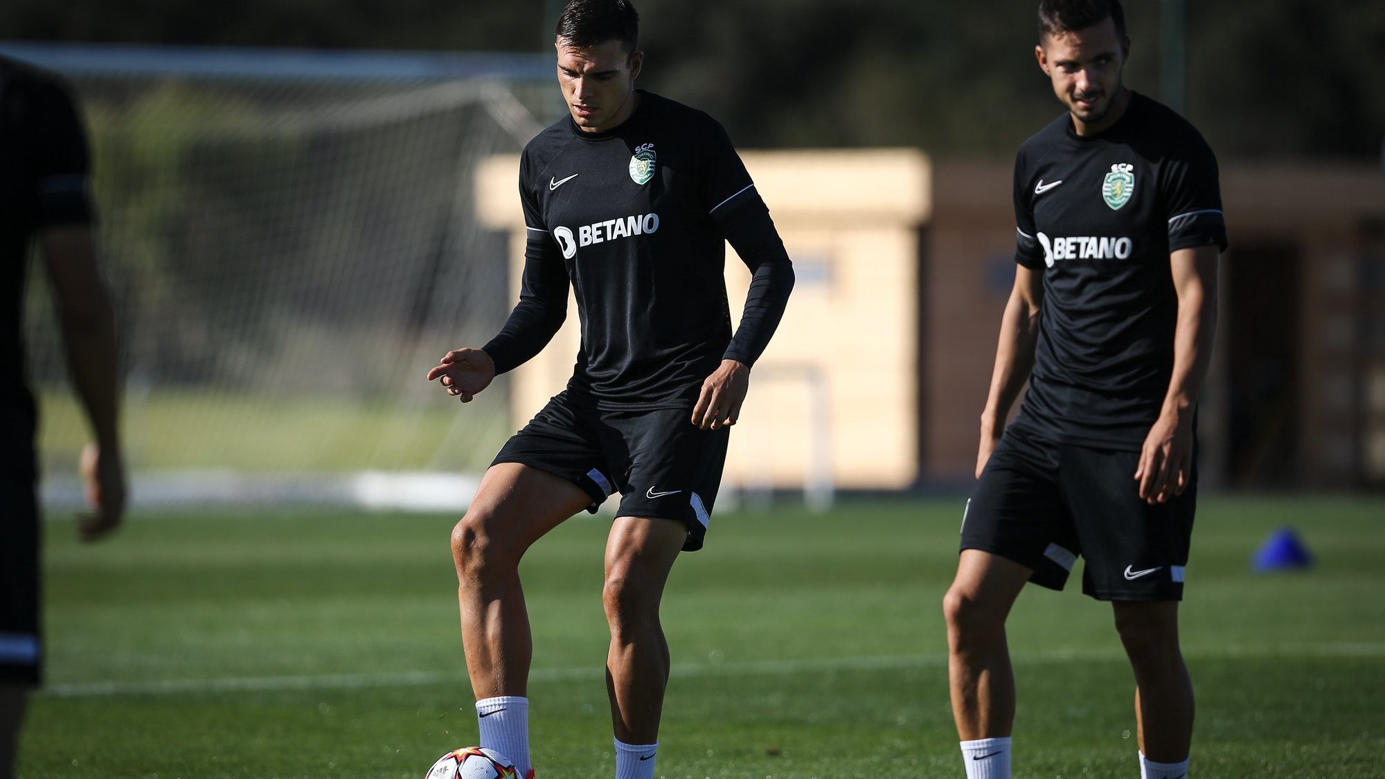 Sporting players João Palhinha (L) and Pablo Sarabia (R) in action during a training session in Alcochete, Portugal, 27 September 2021. Sporting CP will face Borussia Dortmund in Germany on 28 September 2021 in their UEFA Champions League group stage soccer match. RODRIGO ANTUNES/LUSA