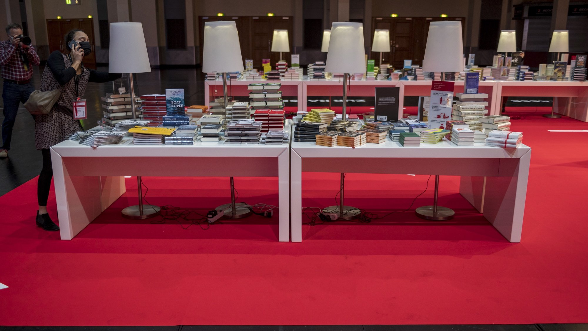 epa08740309 A general view of a table with books prior to the opening conference of the 2020 Frankfurt Book Fair during the coronavirus pandemic in the &#039;Festhalle&#039; in Frankfurt am Main, 13 October 2020. The Frankfurt Book Fair is the world&#039;s largest trade fair for books but is taking place this year at a much smaller scale and with many events either online or scattered throughout the city of Frankfurt due to the coronavirus pandemic. This year&#039;s Special Edition of the Book Fair takes place from 14 October to 18 October 2020.  EPA/THOMAS LOHNES / POOL