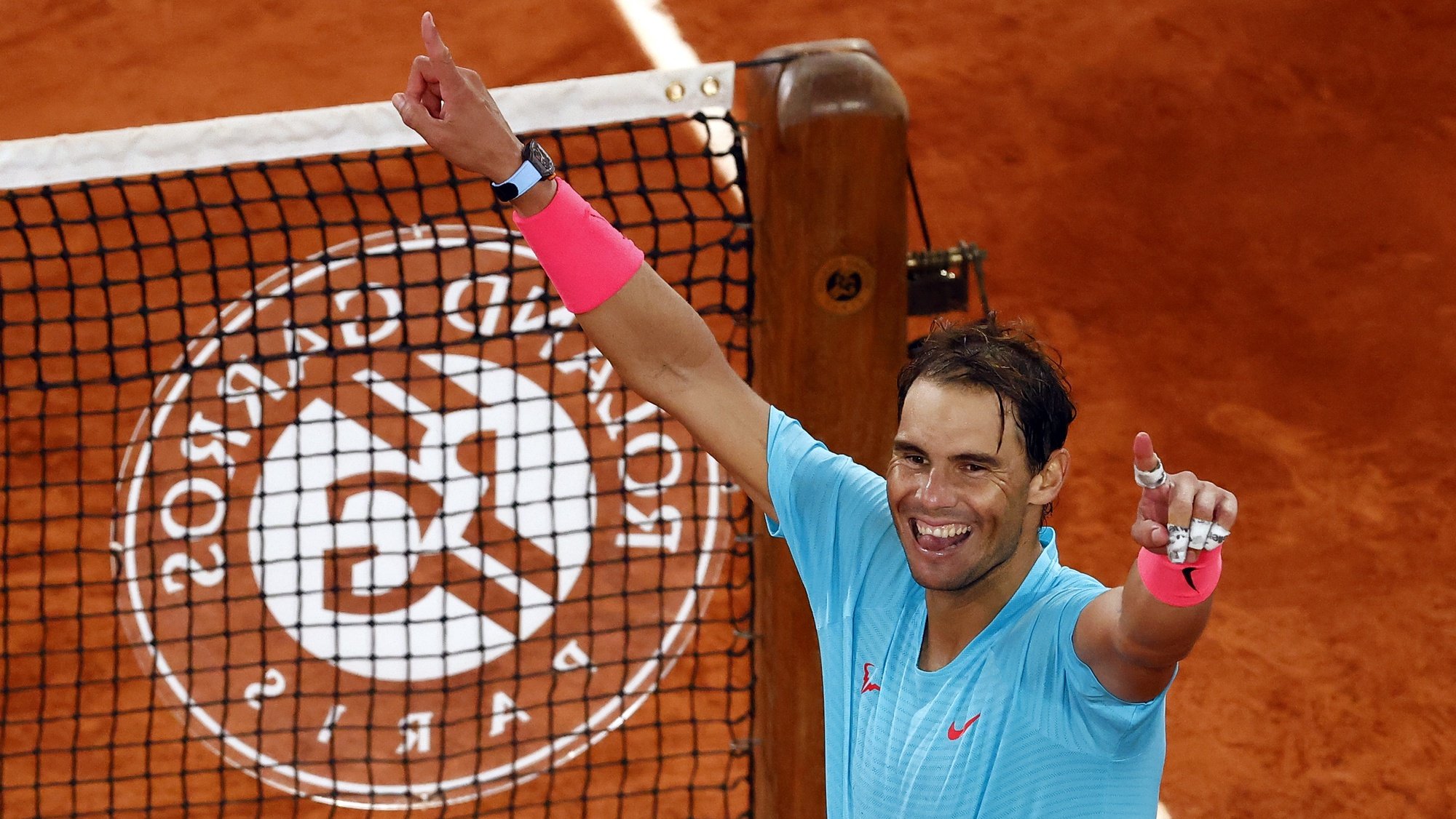 epa08736144 Rafael Nadal of Spain reacts after winning against Novak Djokovic of Serbia in their men’s final match during the French Open tennis tournament at Roland ​Garros in Paris, France, 11 October 2020.  EPA/IAN LANGSDON