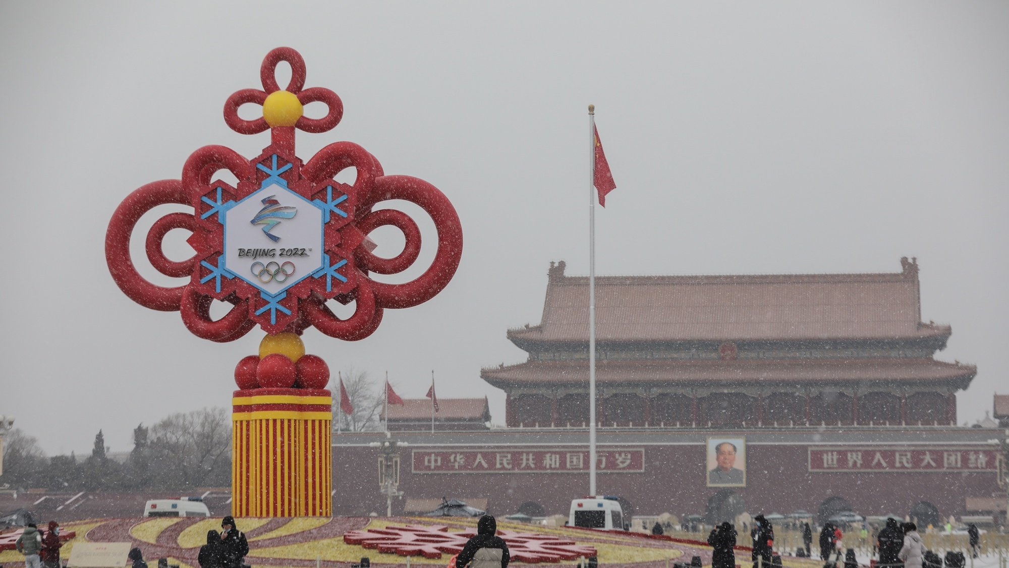 epa09699341 A view shows a decoration for the Beijing Winter Olympics Games in Tiananmen Square in Beijing, China, 21 January 2022. China is scheduled to host the Beijing 2022 Olympic and Paralympic Winter Games in February, making its capital the first city in the world to host both Summer (2008) and Winter Olympics (2022).  EPA/WU HONG