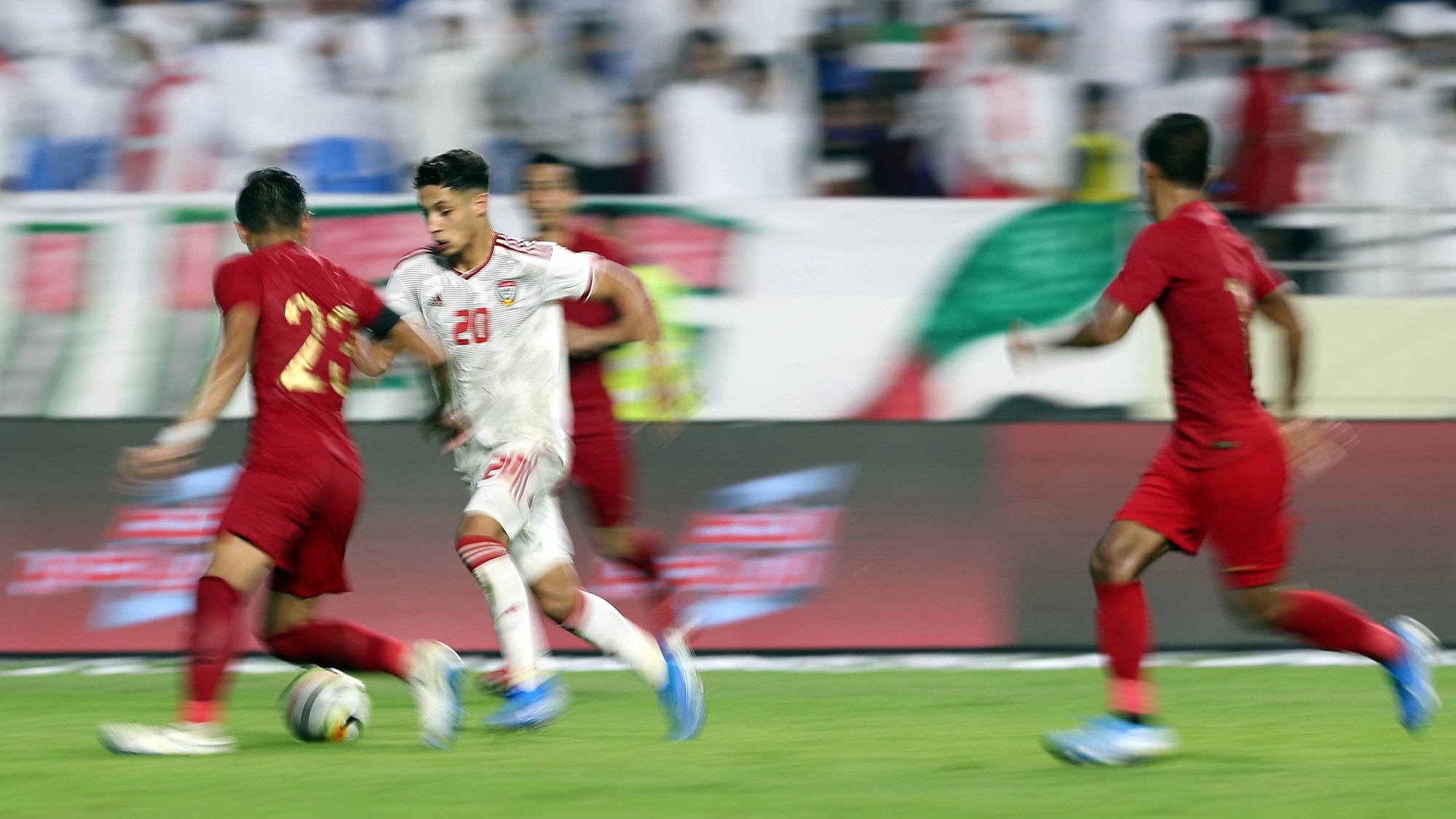 epa07911016 Ali Amro of UAE in action (2-L) during the FIFA World Cup 2022 and AFC Asian Cup 2023 qualifier soccer match group G between UAE and Indonesia in Dubai, United Arab Emirates on 10 October 2019.  EPA/ALI HAIDER
